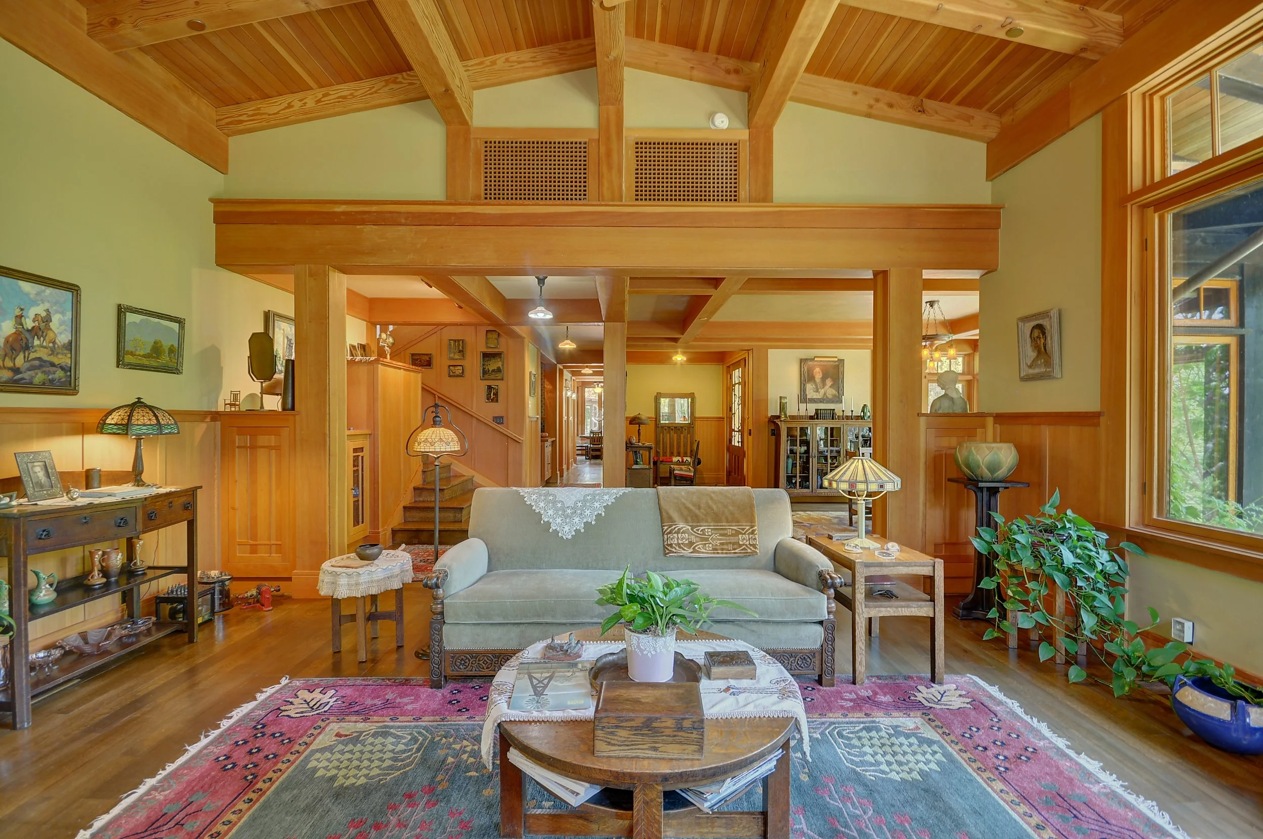 contemporary craftsman farmstyle rustic living stone fireplace exposed wood ceiling