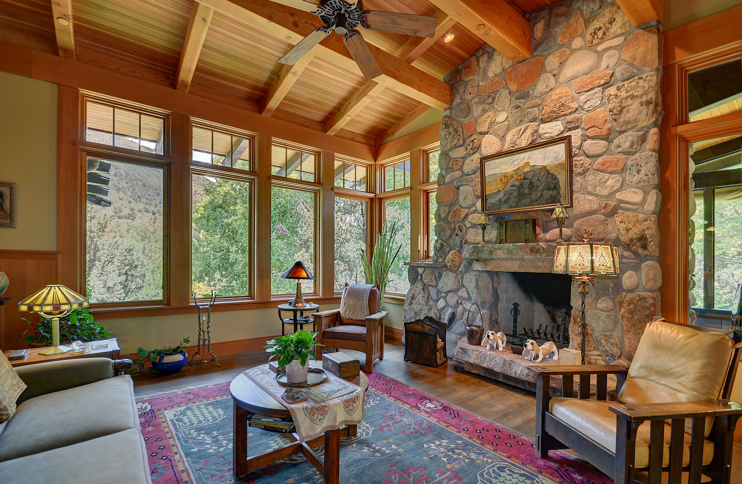 contemporary craftsman farmstyle rustic living stone fireplace exposed wood ceiling