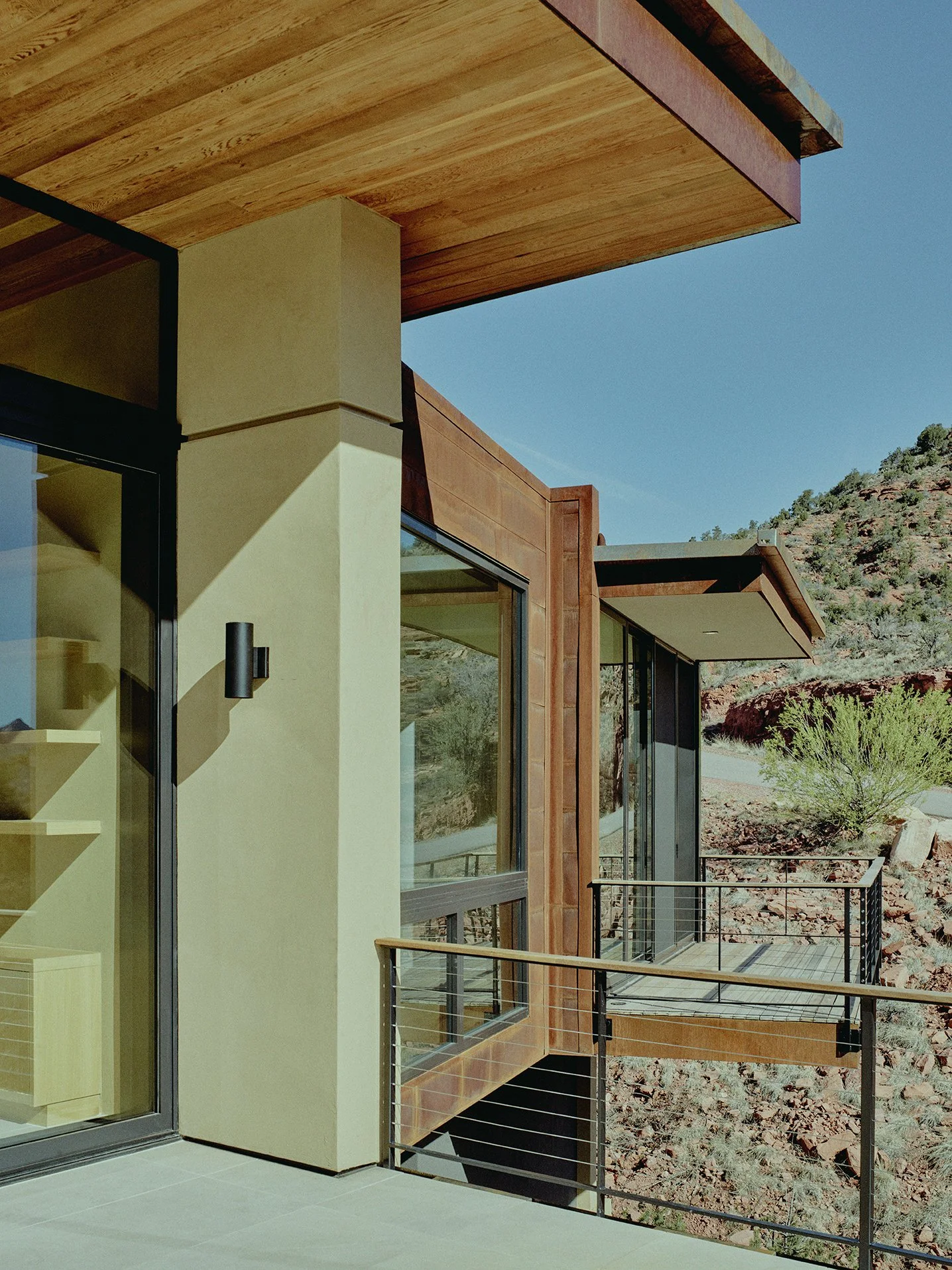 custom deck overhang rusted copper facade metal paneling