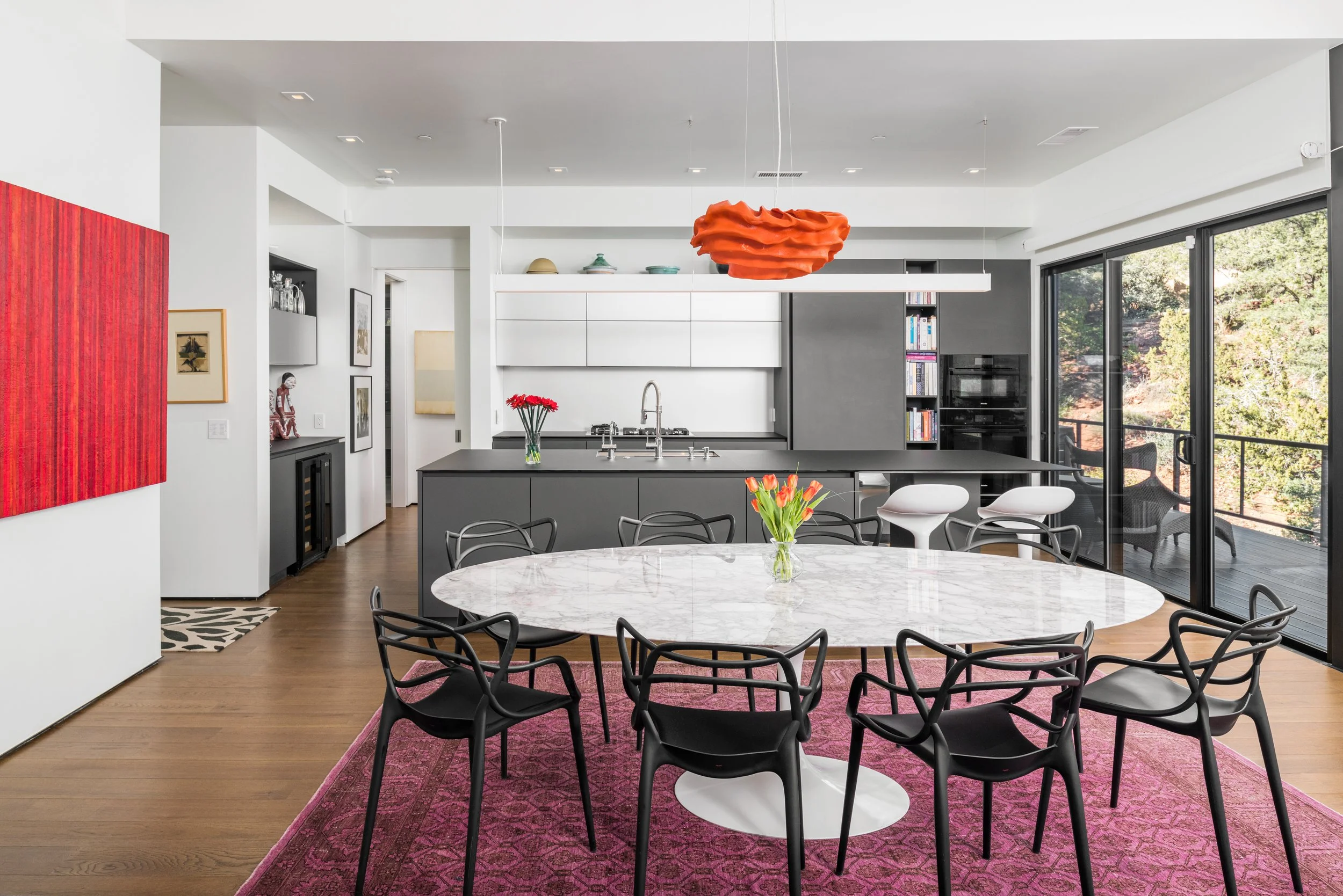 open concept living dining space contemporary lines clean minimalist palette