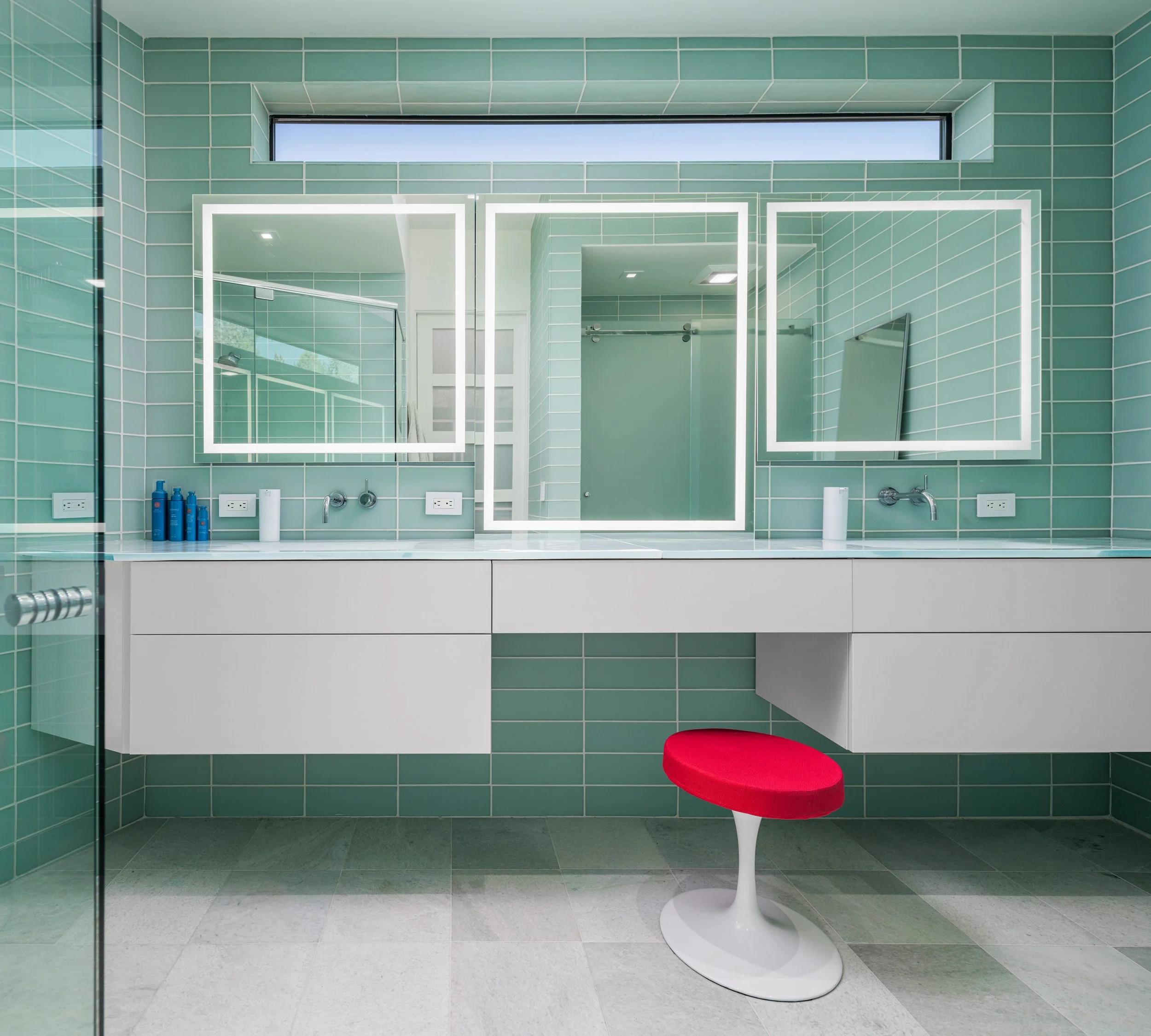 luxury custom home blue tile retro bathroom illuminated mirror