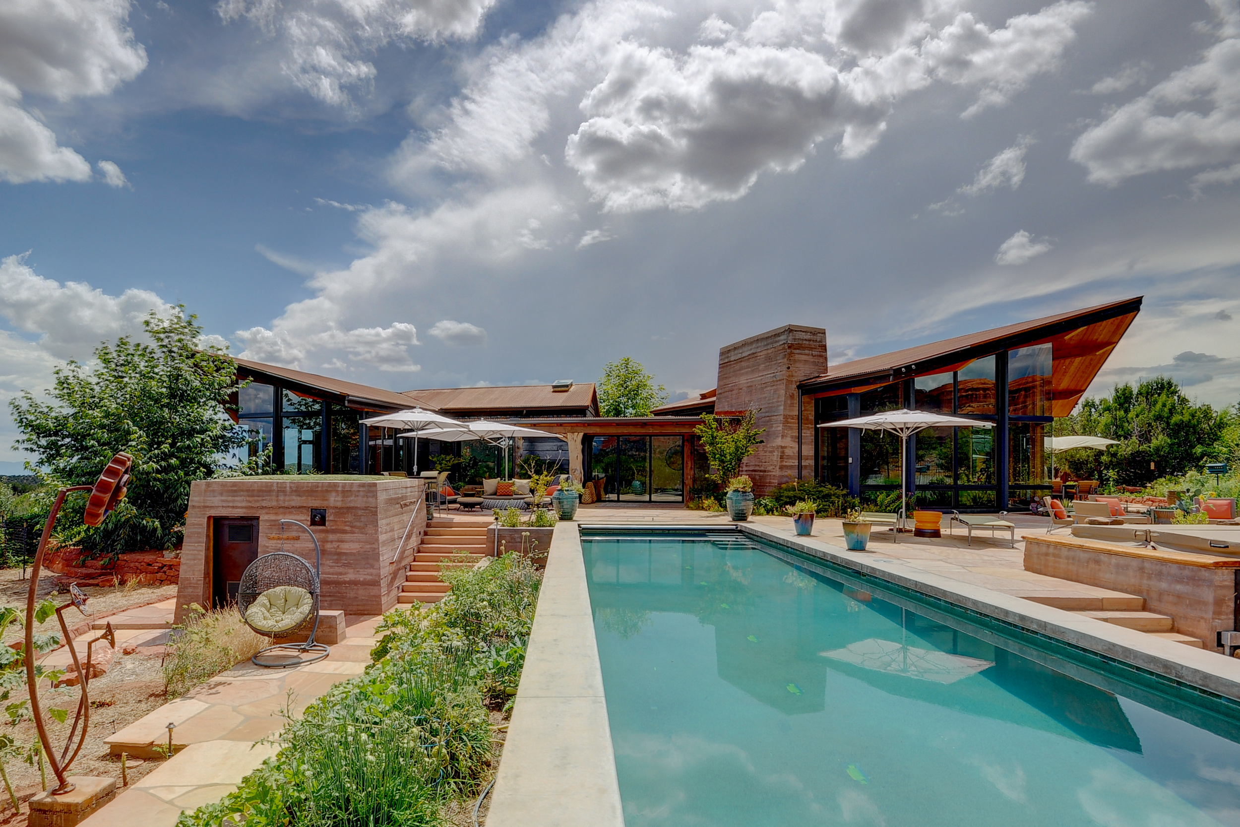 Expansive vernacular modern southwestern private residence Sedona Arizona architecture outdoor living swimming pool