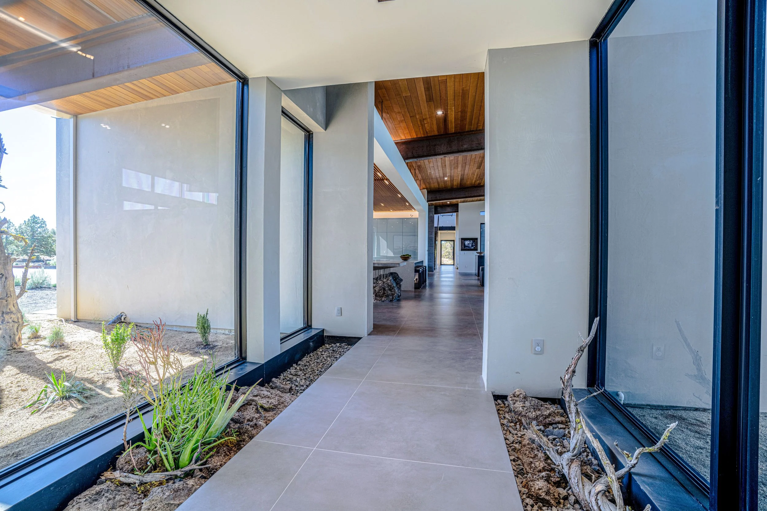 indoor-outdoor corridor interior landscaping luxury modern retreat