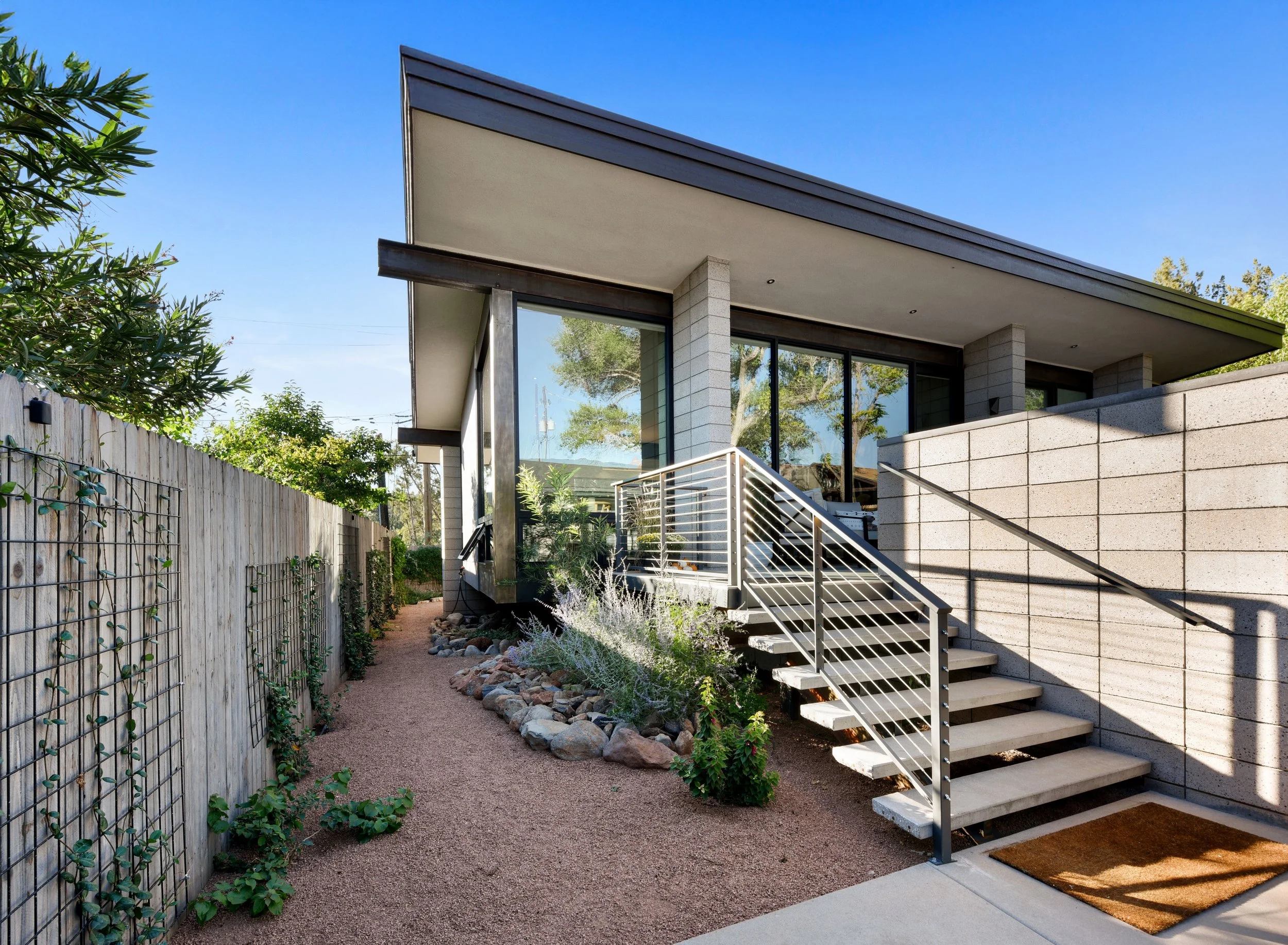 Clean lines and modern finishes establish a bold entry to this small home in downtown Sedona. 