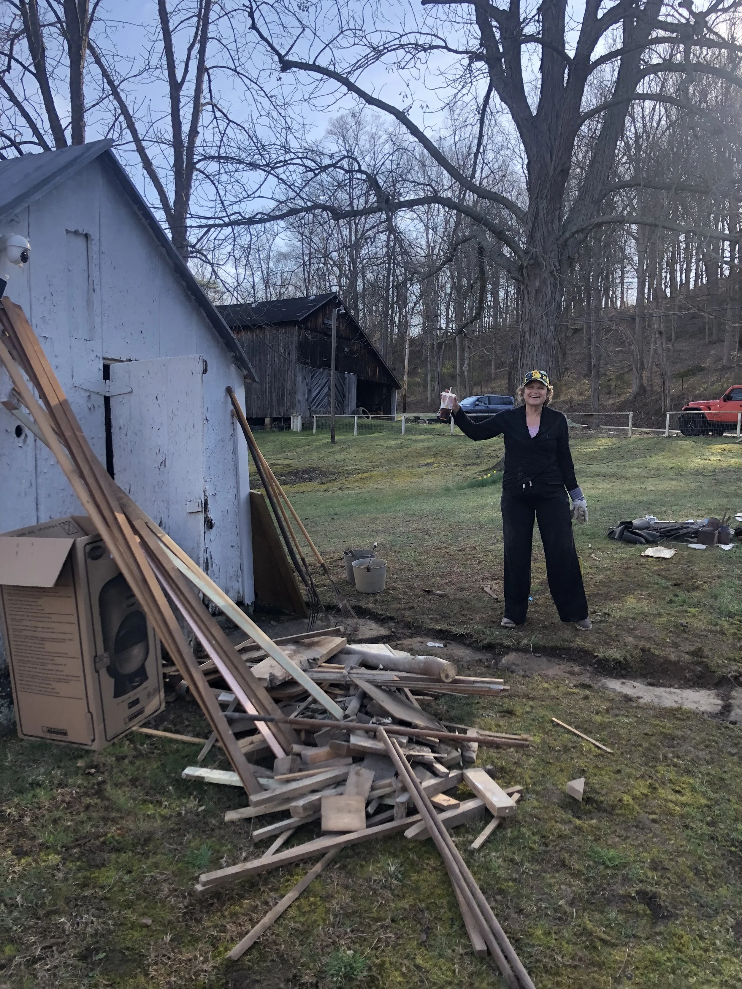 Laura decluttering the shed.