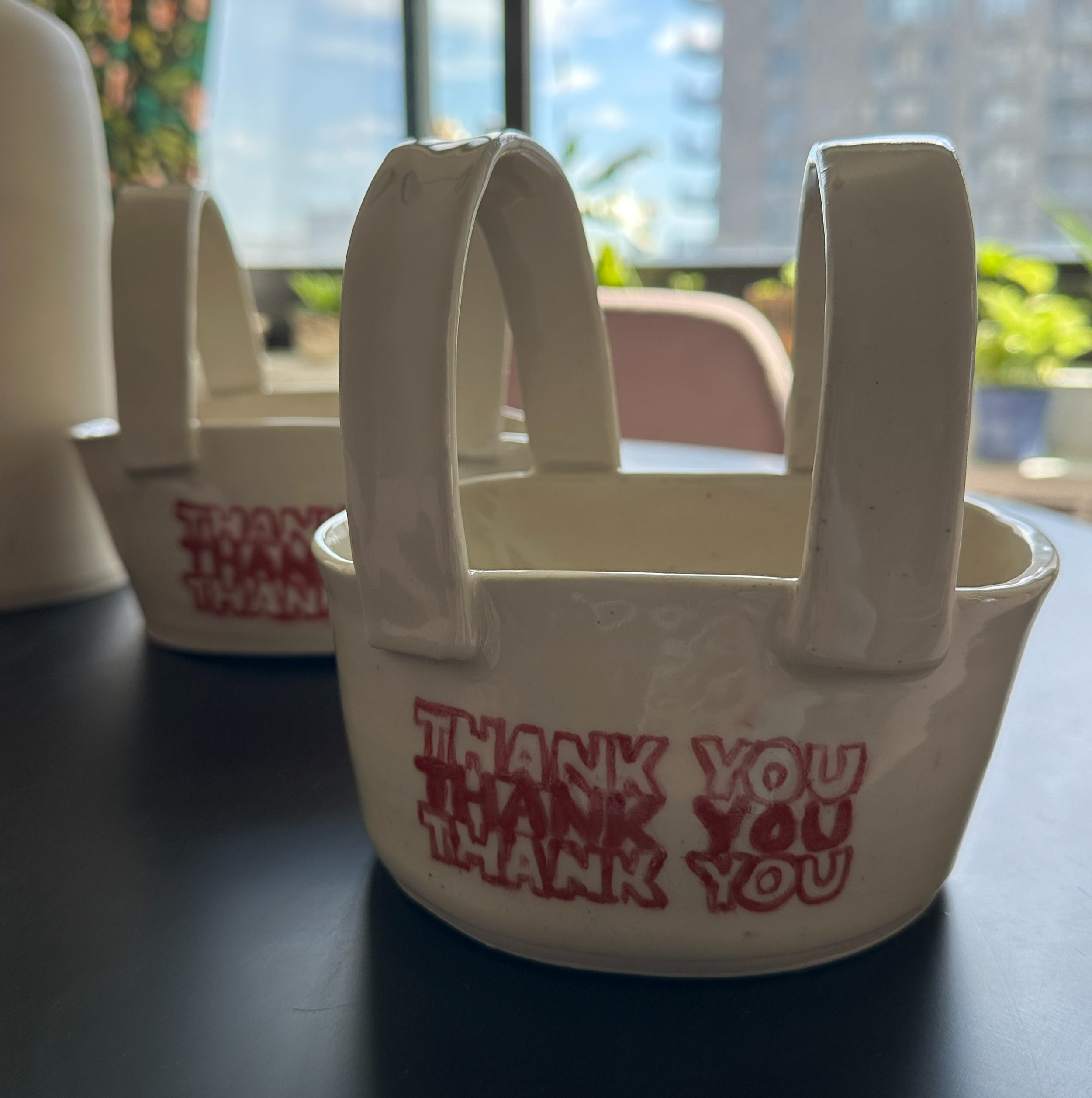 Small white ceramic baskets with red