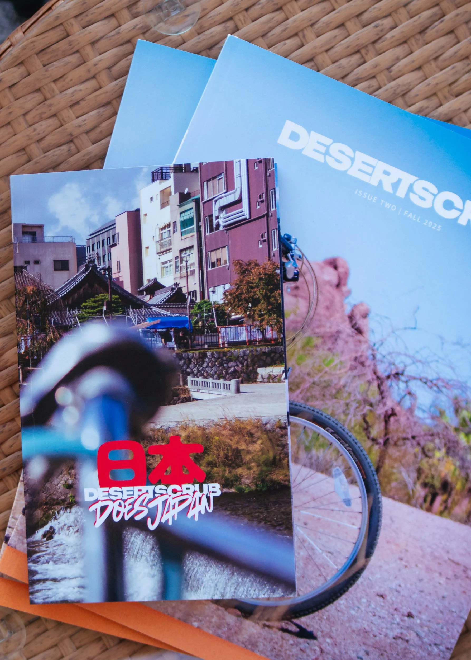 stack of Desertscrub magazines on a table