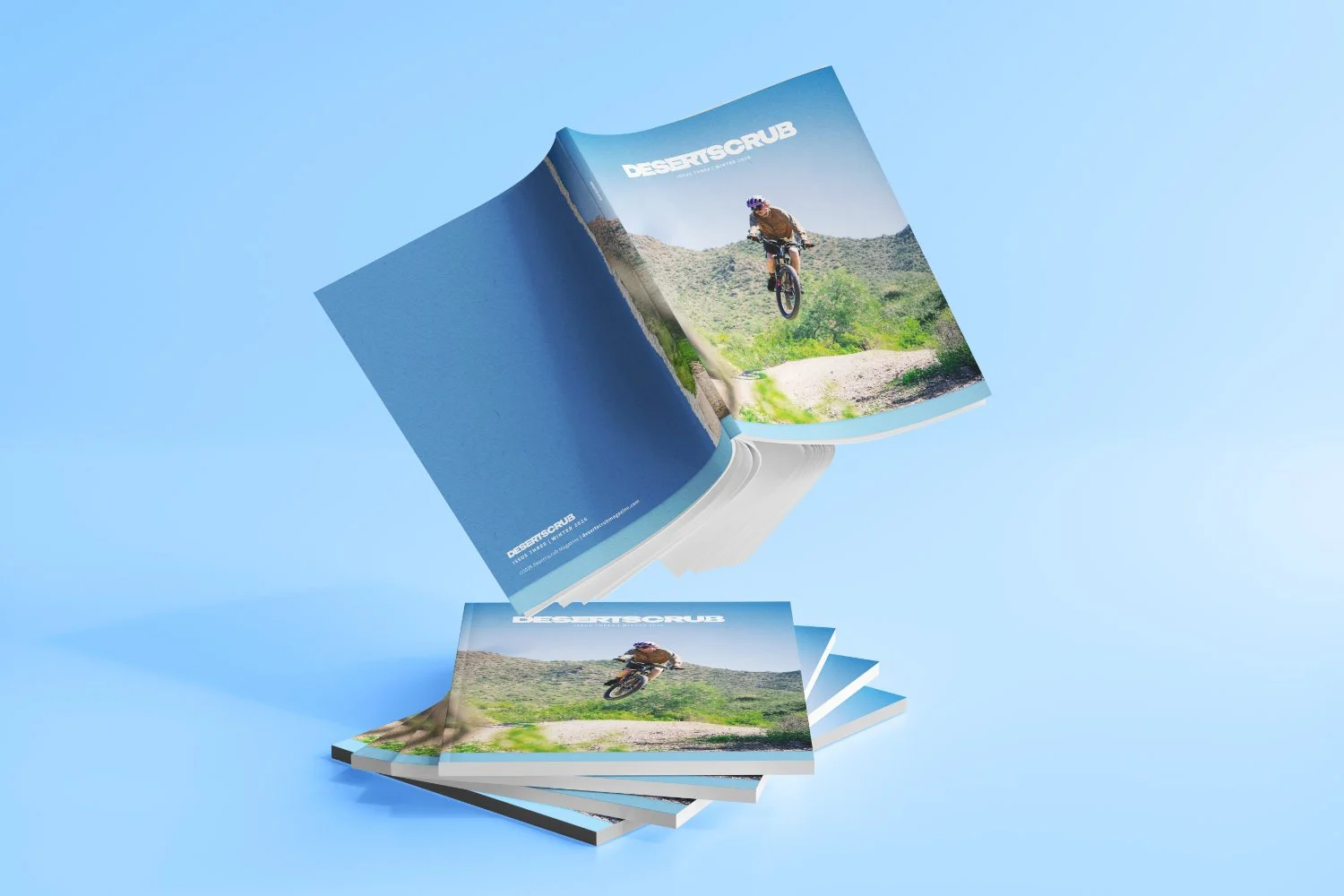 stack of magazines with one falling from sky