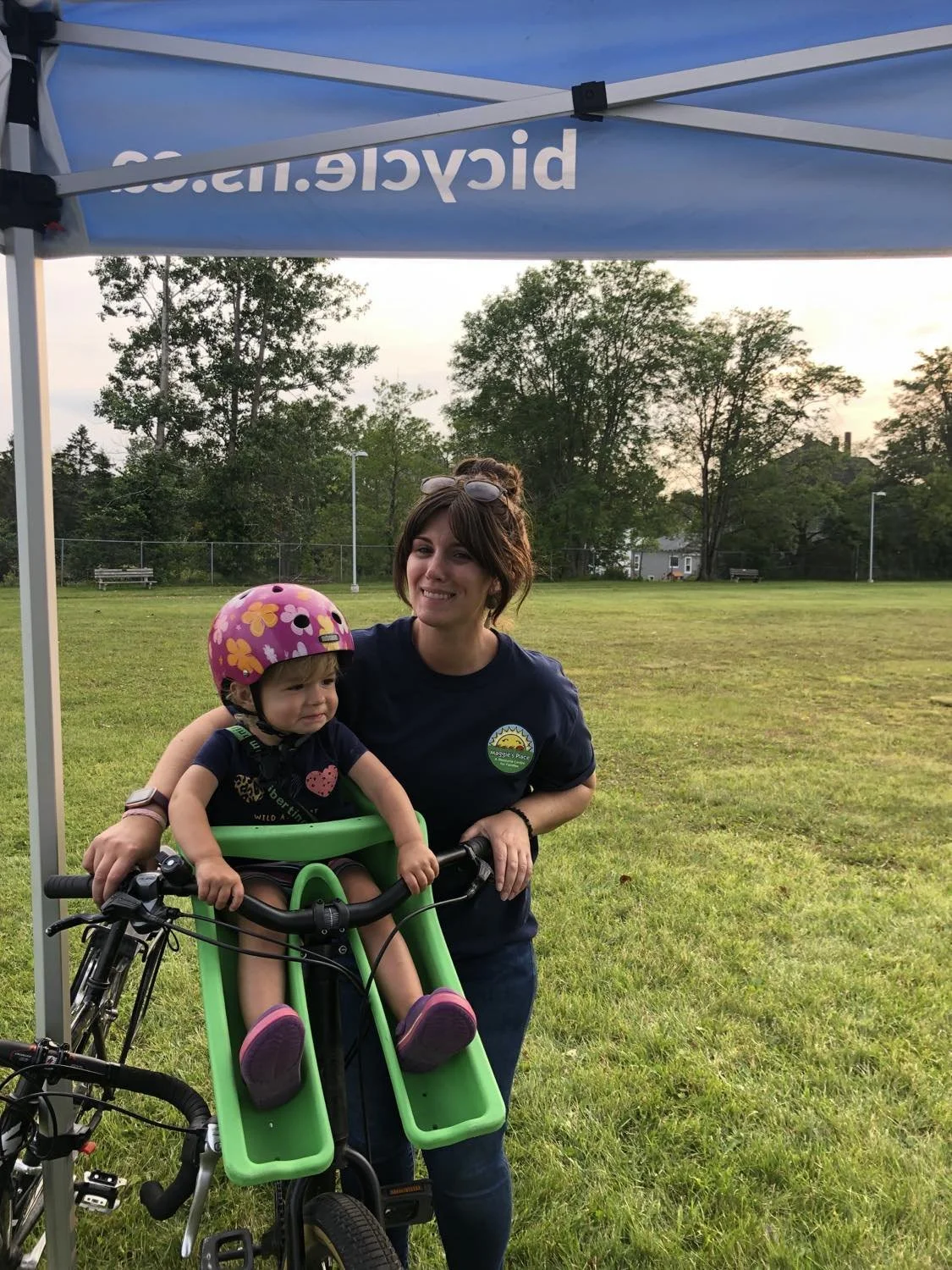 Woman and baby on bike
