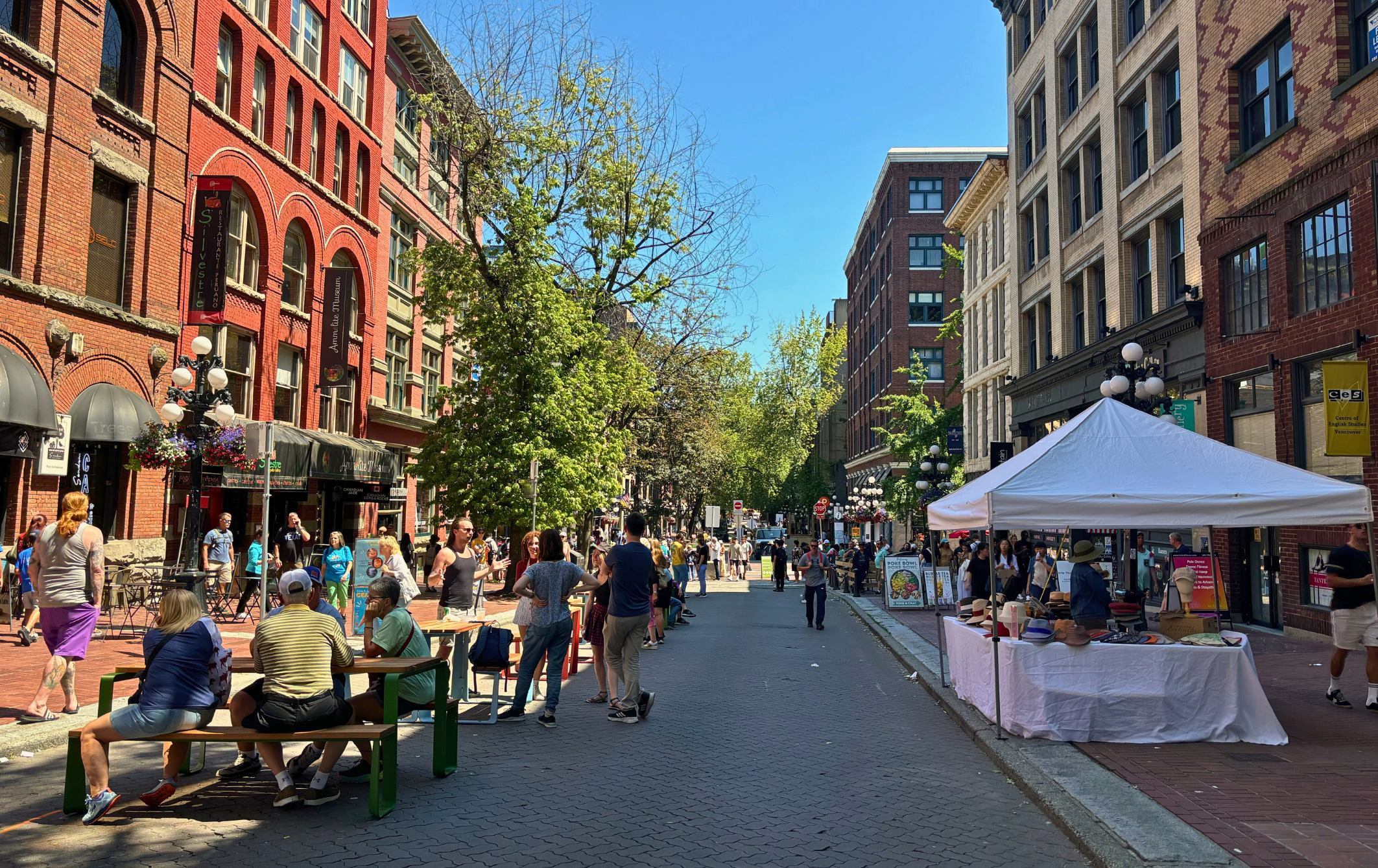 The temporary activation of Water Street in Gastown of Vancouver, BC enables a radically different use of the public realm than moving cars through space. Photo taken by  Sarah Roach, 2024.   