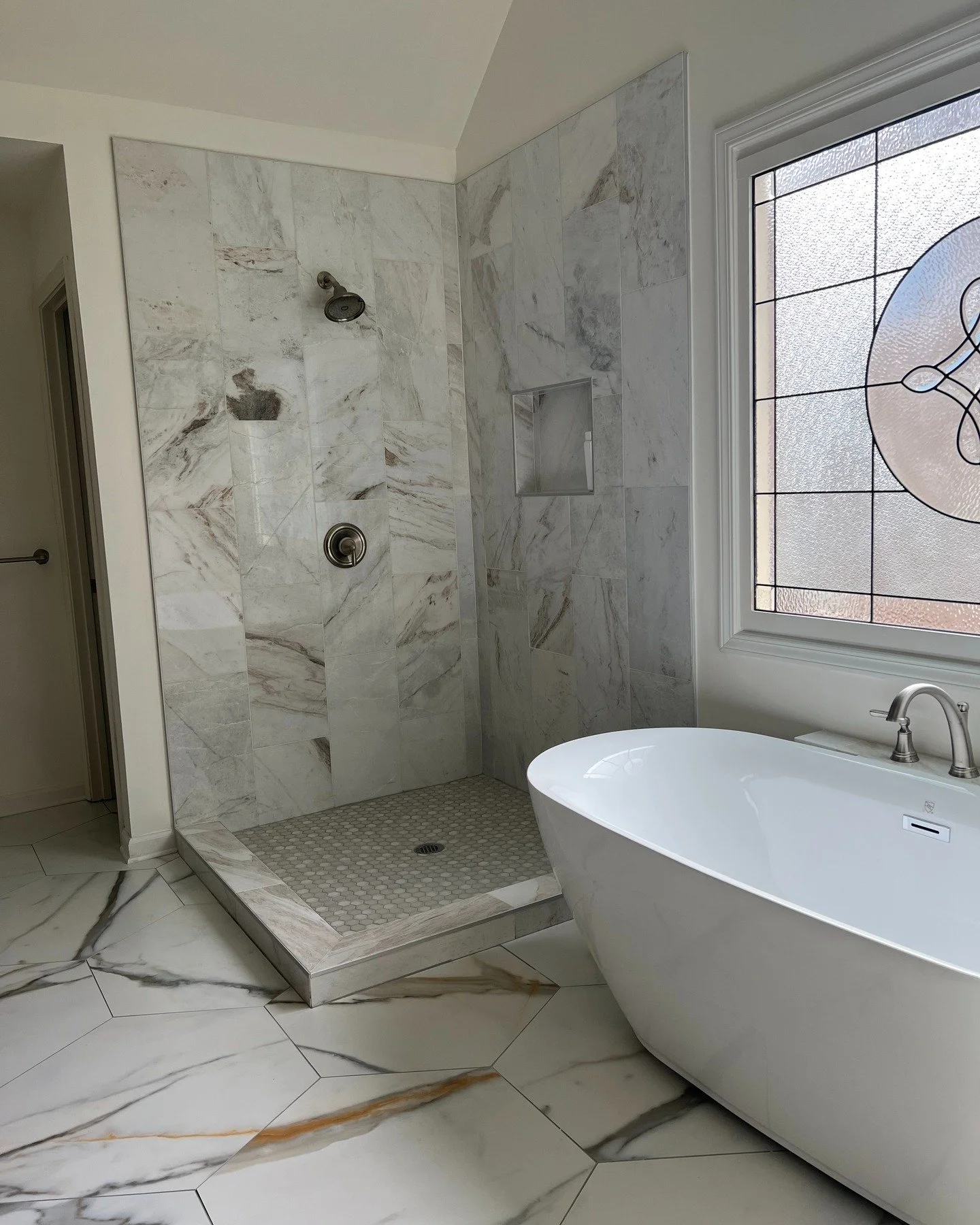 Our client in Woodstock, GA dreamed of a spa-like retreat, and this custom glass shower install was the finishing touch that brought their bathroom remodel to life. The seamless glass enclosure not only elevates the look of the space but also makes t