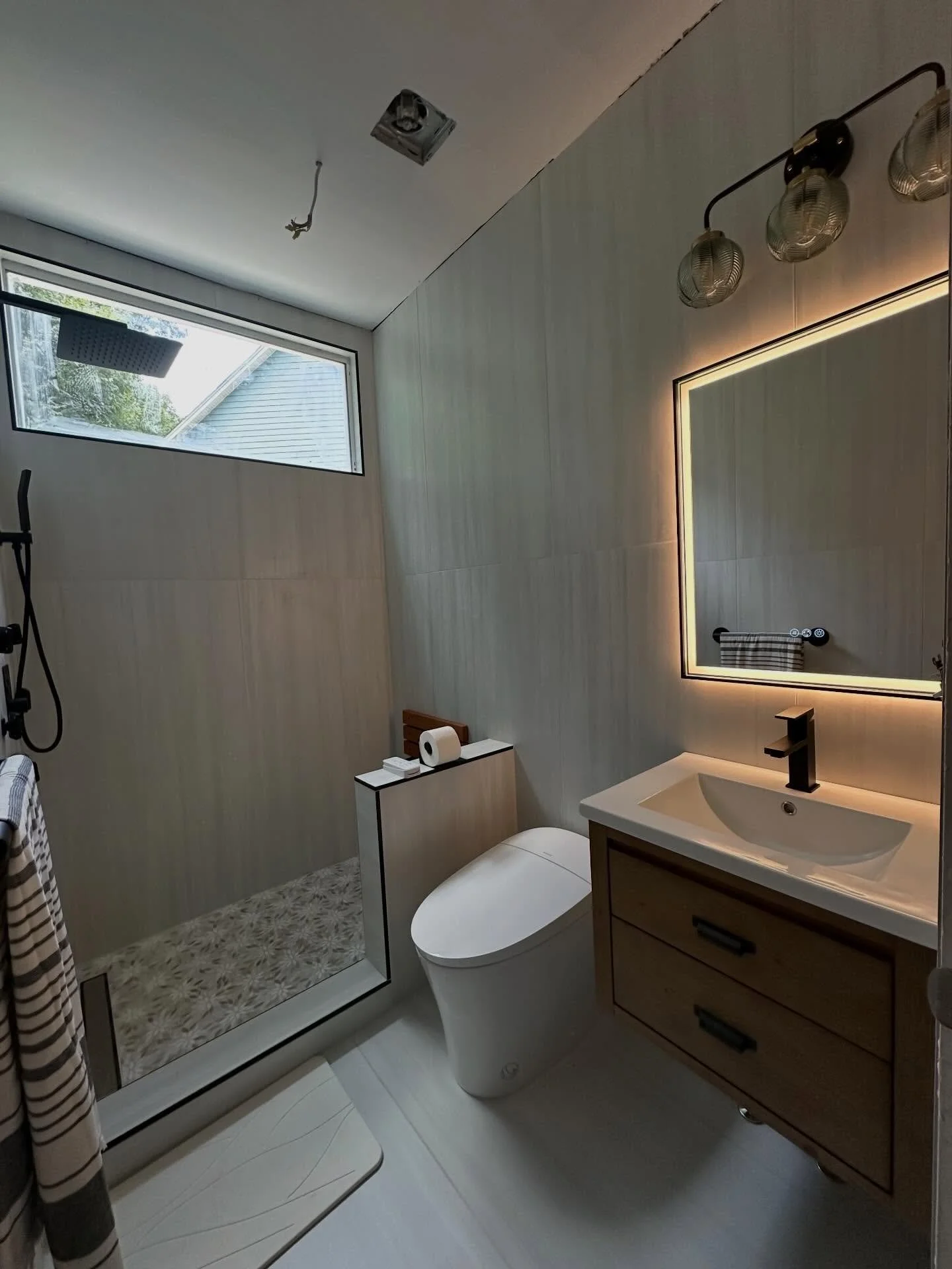 Developing project &hellip;

This bathroom is in the works and you can already tell how it is taking on that perfect mix of warmth and modern edge. Clean lines, rich texture, and finishes that will age beautifully.

Matte black, wood tones, large for