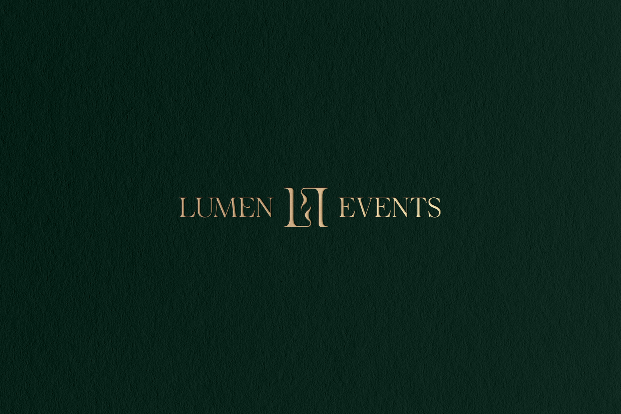Dark green textured background with gold-colored text that reads 'Lumen Events' and a stylized letter 'L' between the words.