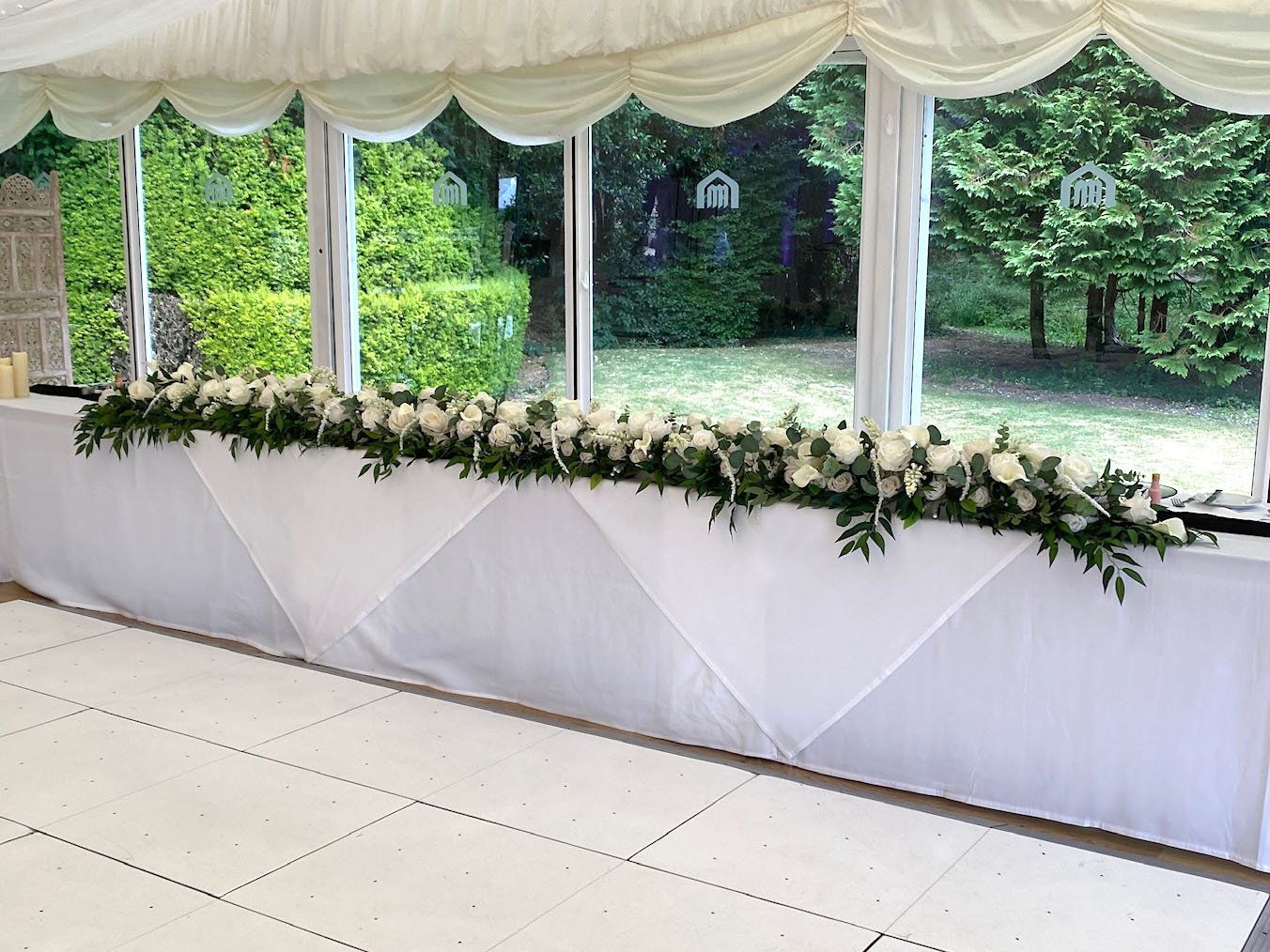 Long wedding table floral garland from the Grace collection