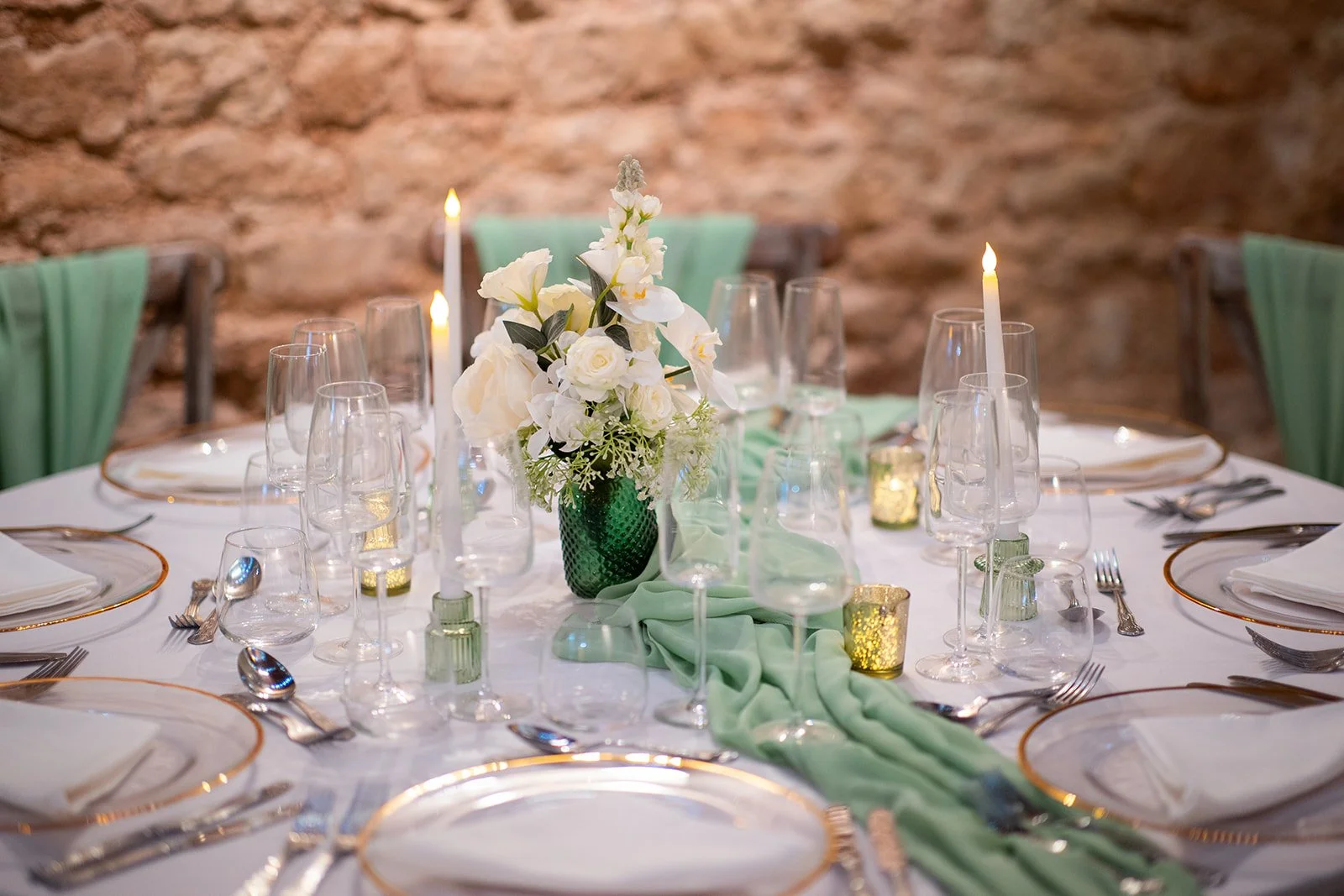 Tiffany mini floral arrangement with white roses and hydrangeas used as a wedding table centrepiece.