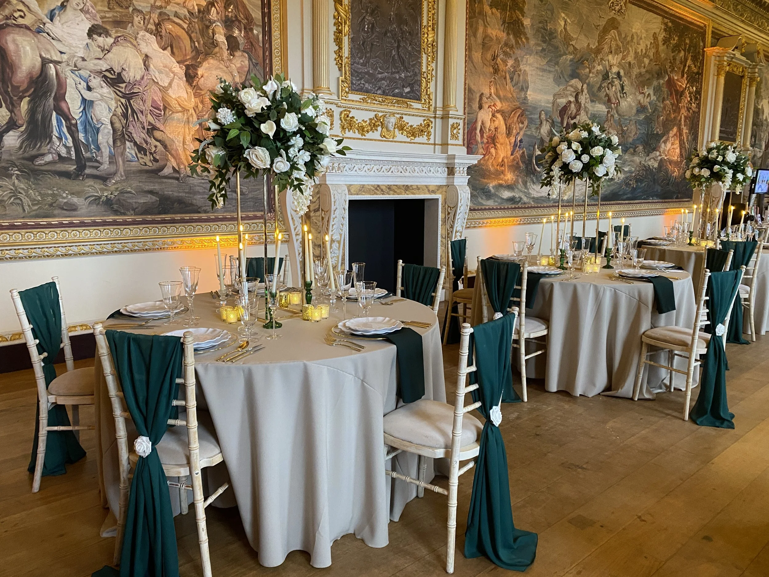 Stone wedding tablecloth styled with flowers and coordinated place settings, available to hire from Rosewood & Pearl.