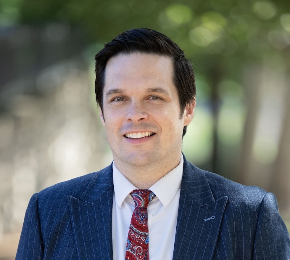 Photo of Attorney Jason Mullikin in suit