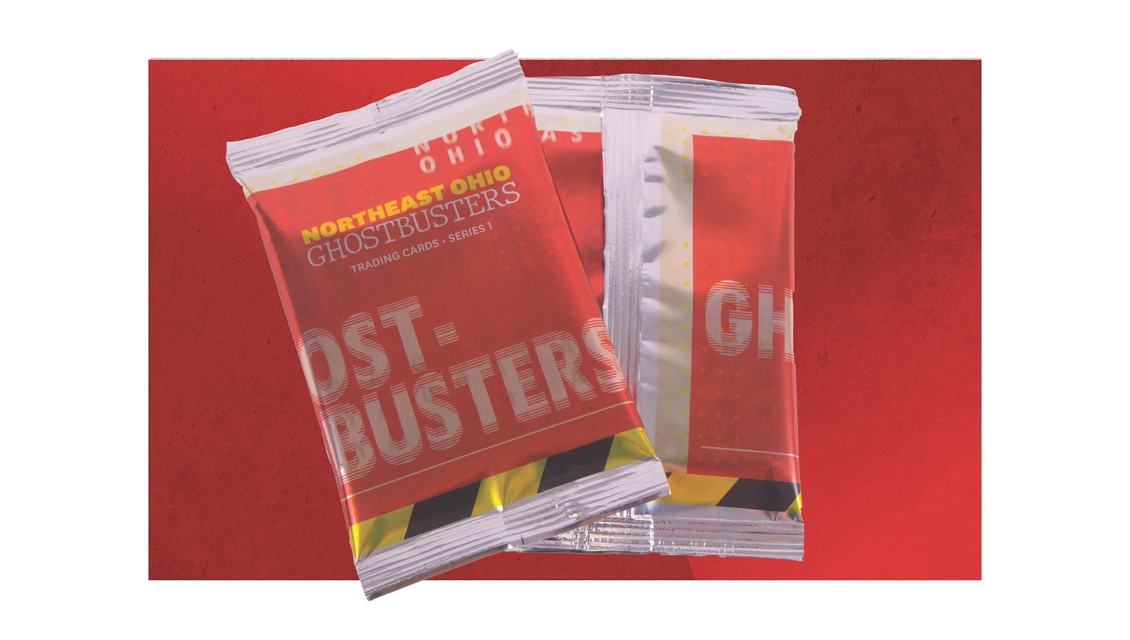 Professionally designed trading card packaging for the Northeast Ohio Ghostbusters. Highlights branding with red, yellow, and black hazard-striping.