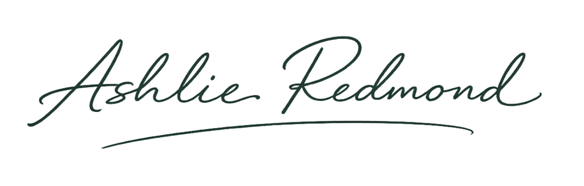 Signature-style text that reads 'Ashlie Redmond'.