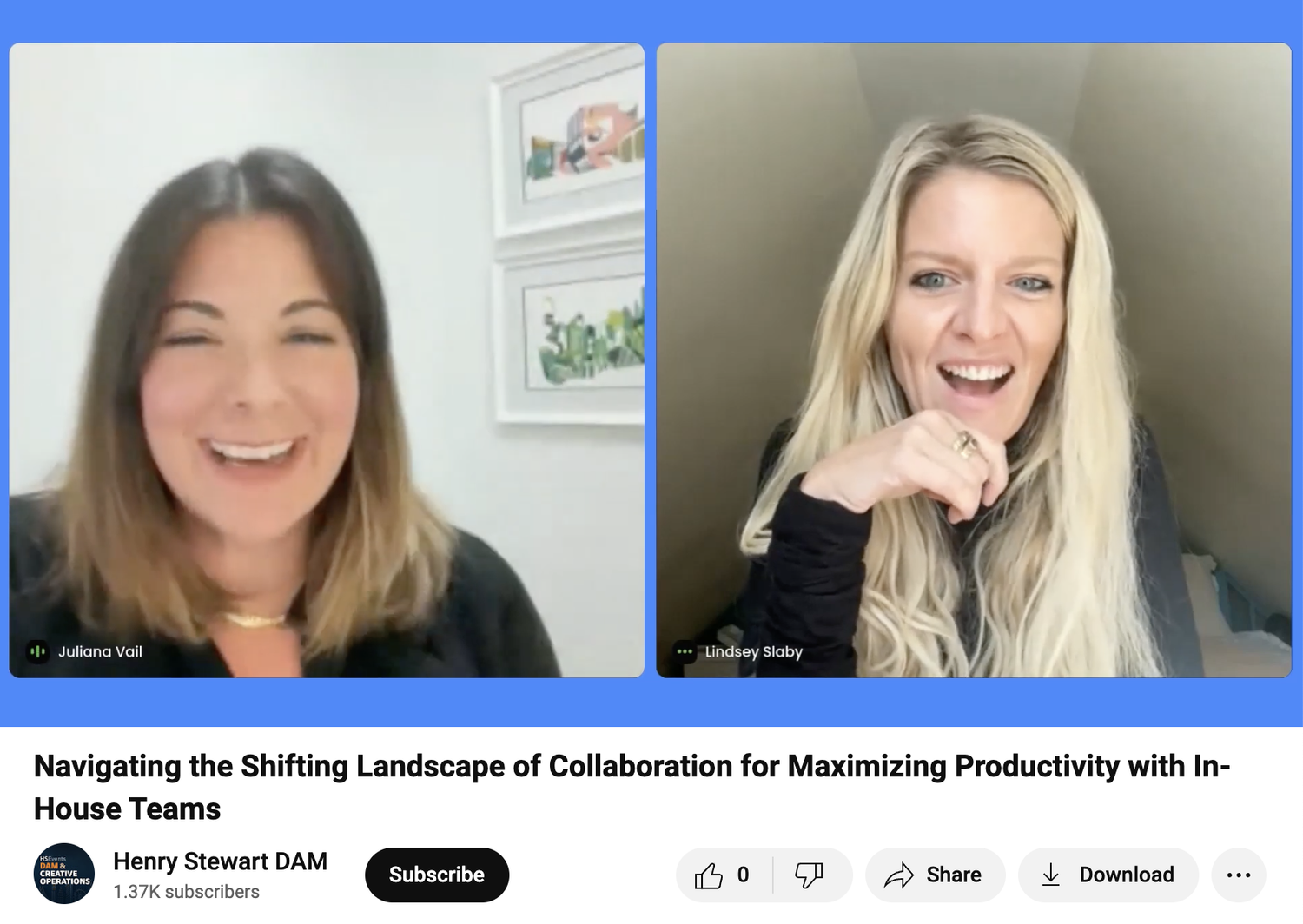 Two women participating in a virtual meeting or webinar, smiling. The woman on the left has medium-length brown hair and is wearing a black top. The woman on the right has long blonde hair and is wearing a black top, resting her chin on her hand. The