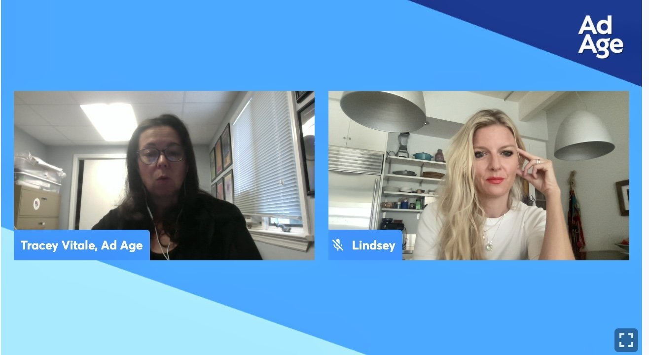 Screenshot of a video call featuring two women; on the left, Tracey Vitale from Ad Age, with dark hair, glasses, and earphones; on the right, Lindsey with long blonde hair, sitting in a kitchen.