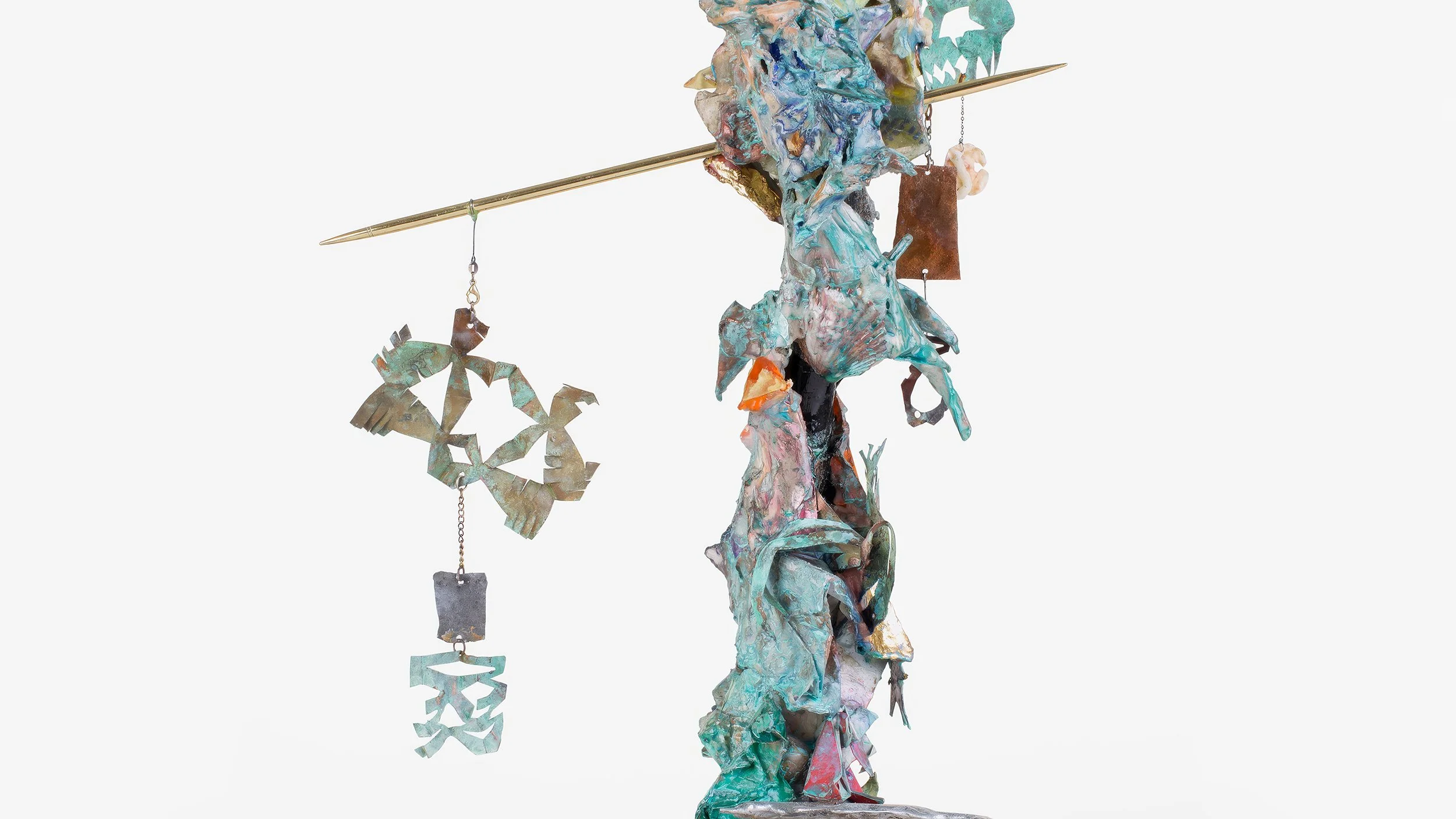 Yasue Maetake Three-Legged Idols detail: close-up of colorful textured form with turquoise oxidized surfaces and hanging geometric metal charms on a horizontal rod
