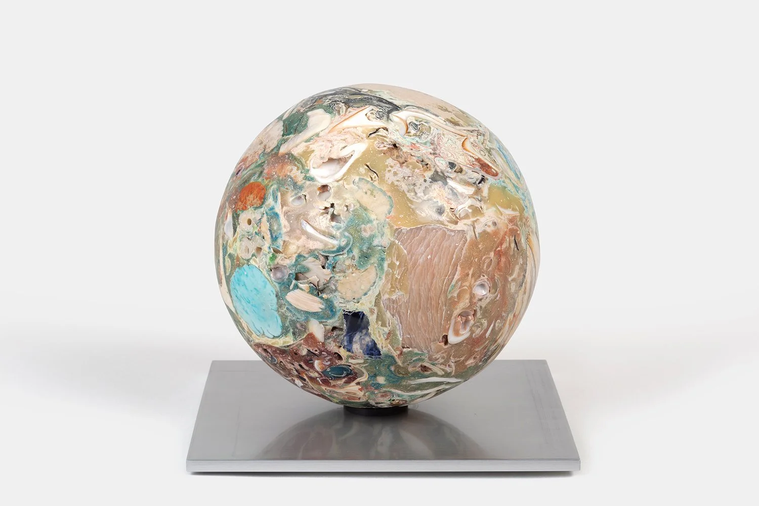 
Orb Materia—Inlet Swallowtail
(2026)
Hand-carved proprietary compound (marine calcite, turquoise, jasper, sea glass, polymer, alabaster, soapstone, marble) on aluminum base. H 8 1/4 x 8 1/2 x 8 in
