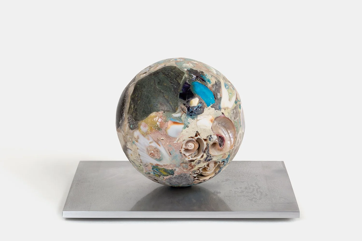 Orb Materia—Mayfly
(2026)
Hand-carved proprietary compound (marine calcite, turquoise, quartz, blue sodalite, granite, sea glass, polymer, marble) on aluminum base. H 6 x 9 x 6 1/2 in
