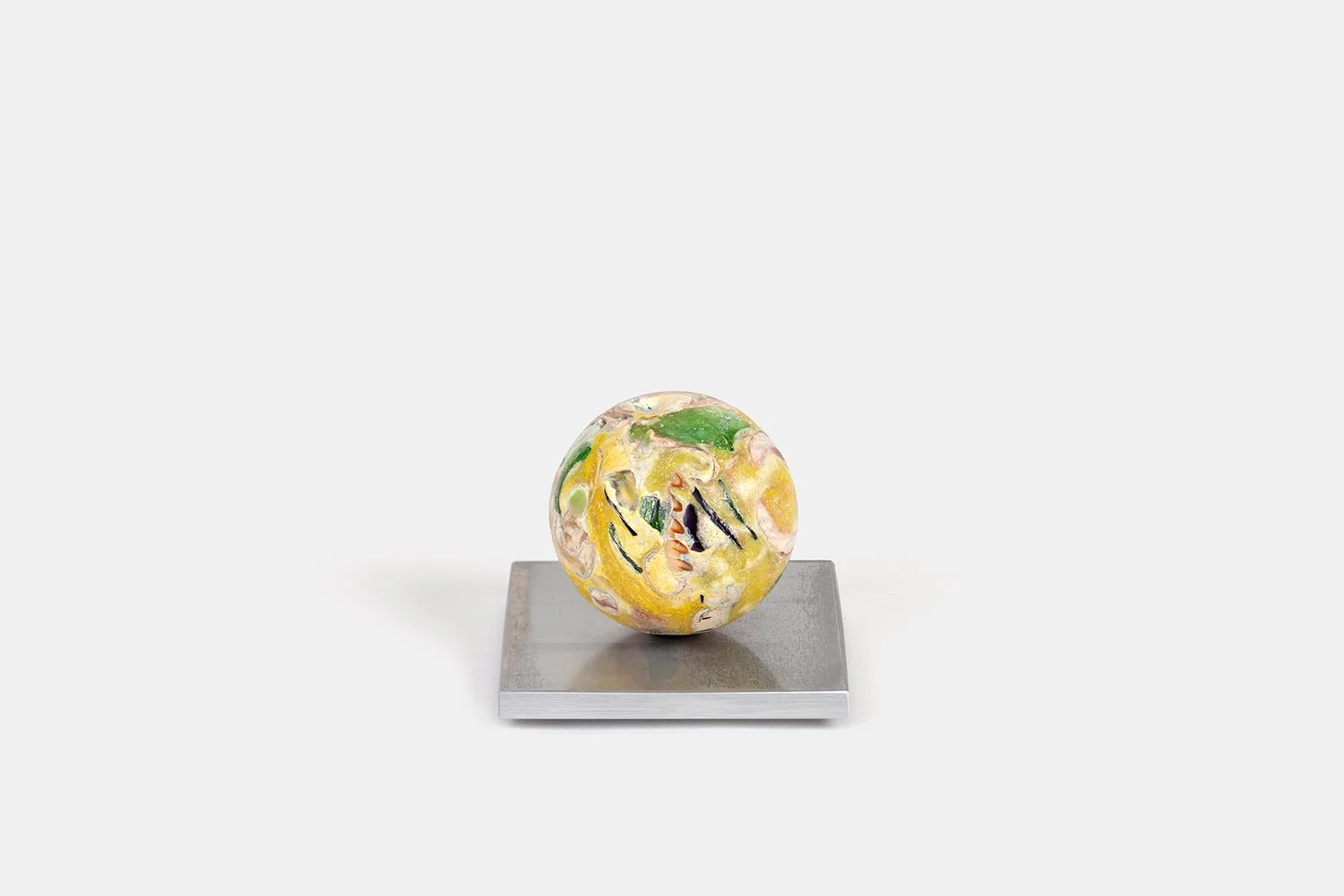 Orb Materia—Yuzu
(2026) 
Hand-carved proprietary compound (marine calcite, polymer, sea glass, marble) on aluminum base. H 2 5/8 x 3 x 3 in
