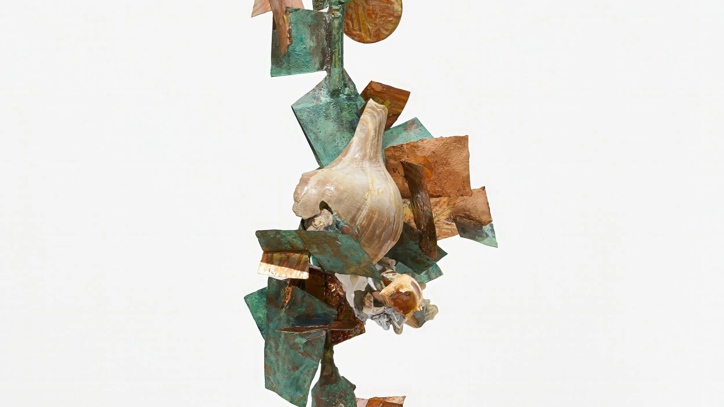 Yasue Maetake Three-Legged Idols detail: close-up of large seashell surrounded by irregular green and copper metal plates in a dense vertical cluster