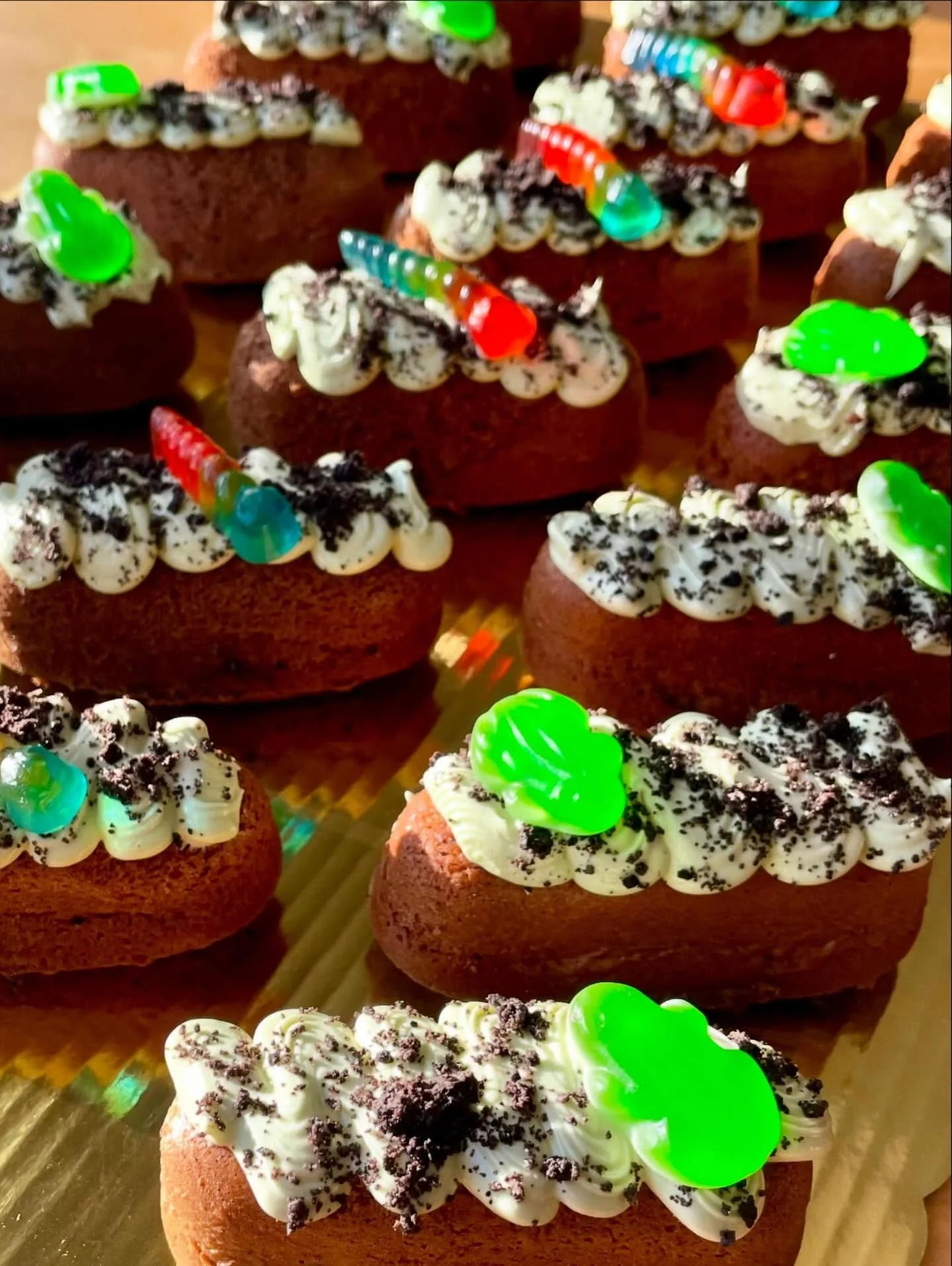 FINALLY an answer to the age old lunchroom question &mdash; Twinkie or Dirt Cup? 

Why not both??

Chocolate sponge, filled with whipped bittersweet chocolate ganache, matcha SMBC, Oreo crumblies, and of course, a gummy 🐸 🪱
