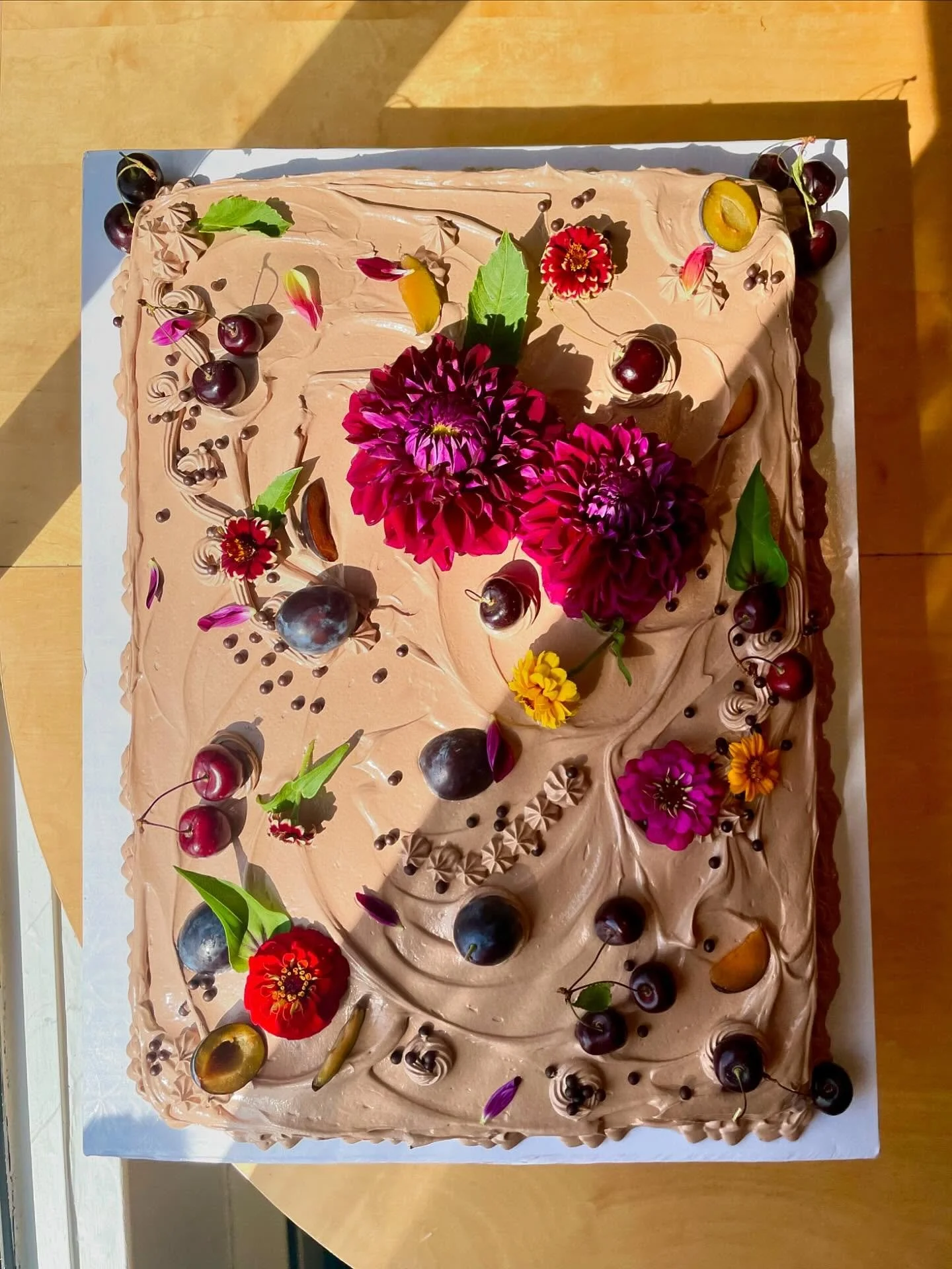 Chocolate espresso cake with chocolate buttercream for Mary! What a big fun canvas for some last bits of summer plums and dahlias
