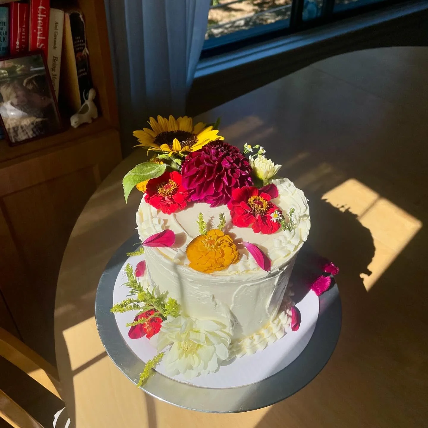 A most important cake for two sweet lovebugs 🐞🐛🐝🐌🦋

For Hailey and Pat &mdash; a Thai tea chiffon cake layered with a condensed milk buttercream, Thai tea custard, and covered with Swiss meringue buttercream and soooo many cutie late summer flow
