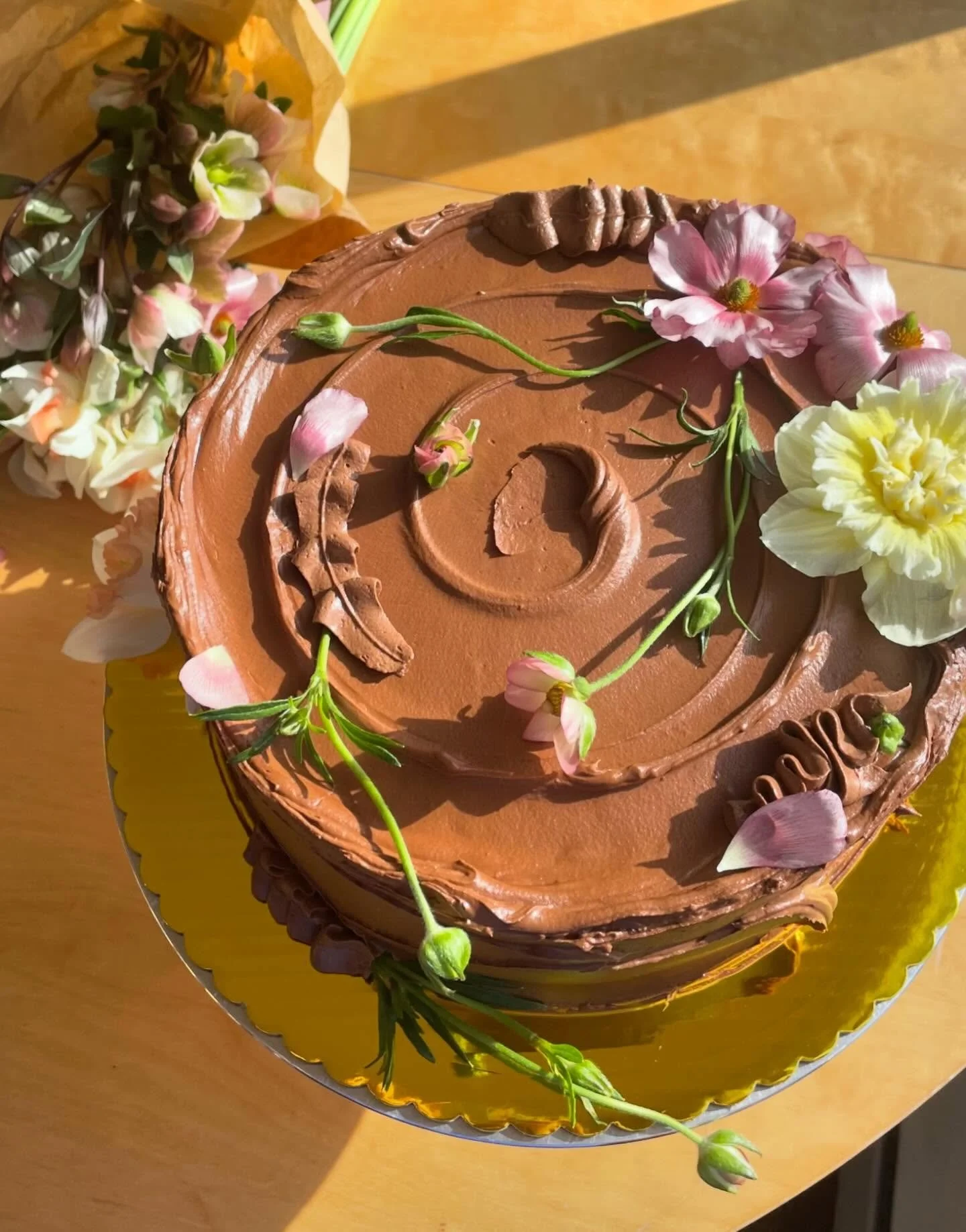 Kathleen&rsquo;s special birthday surprise cake &mdash; white mountain layer cake from Stella Parks Bravetart + silky milk chocolate buttercream

Spring has sprung and I can&rsquo;t wait to begin adding cutesy flowers to my cakes!