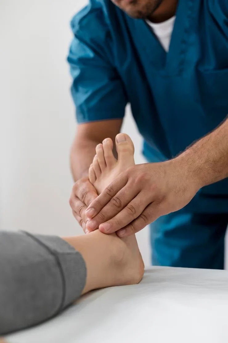 Patient receiving a foot massage for Peripheral Neuropathy