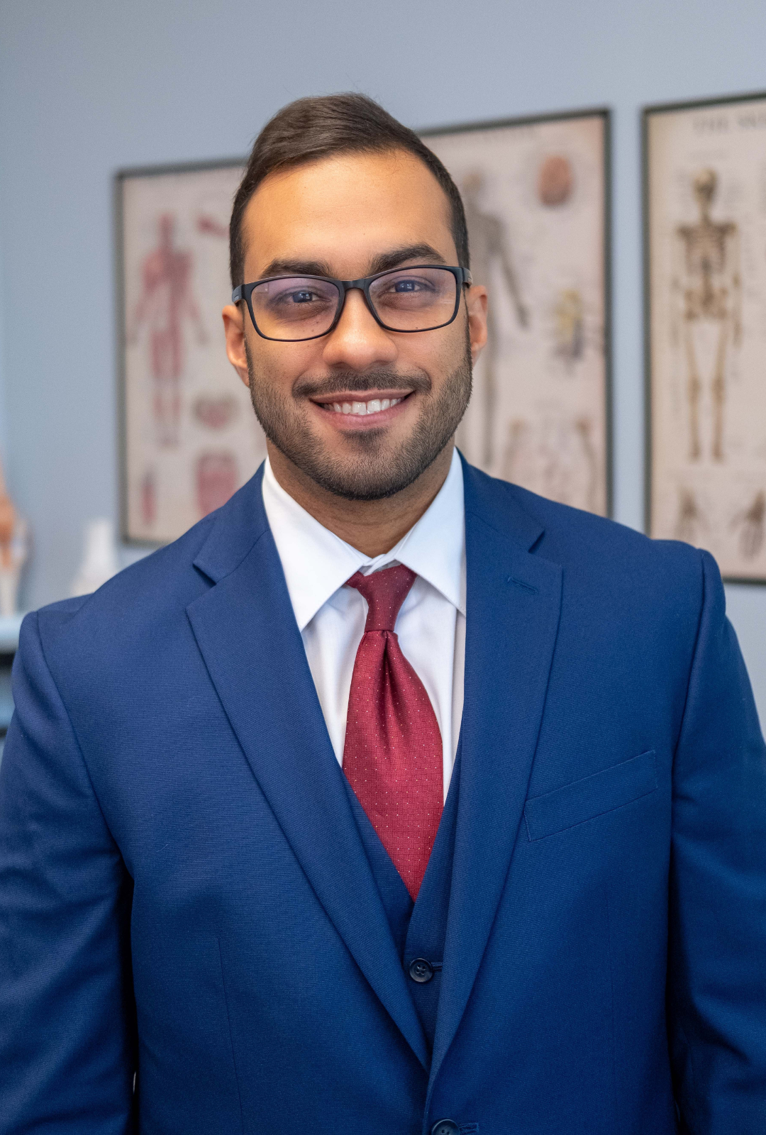 Dr. Luis Lopez smiling at camera, headshot