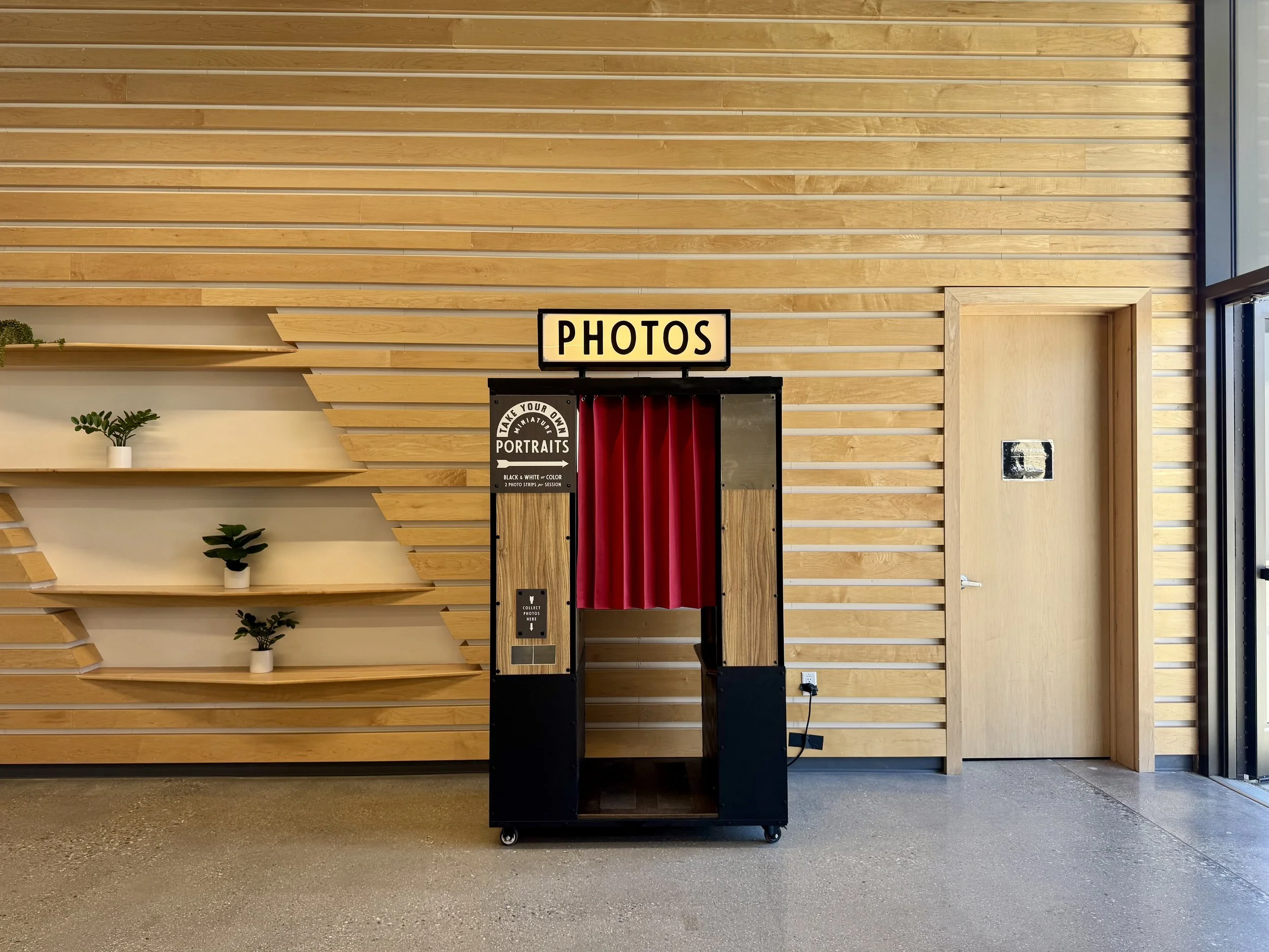 Vintage inspired photo booth in Southern California. Enclosed photo booth with retro vibes. Delivers black and white and color photo strips.