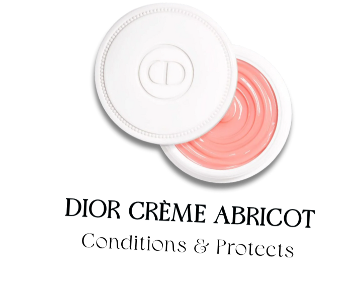 Open jar of Dior Creme Abricot with pink cream inside, with lid partially off.