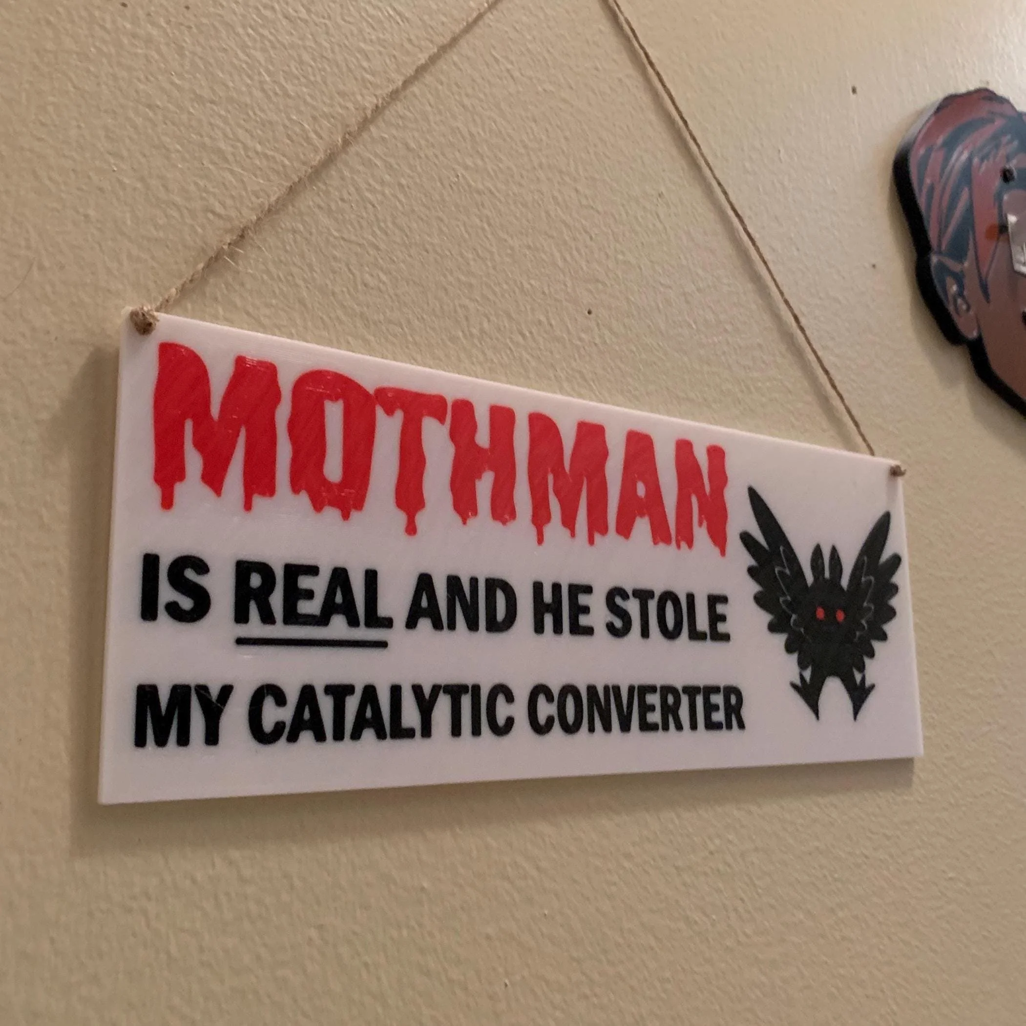 MOTHMAN catalytic converter Sign