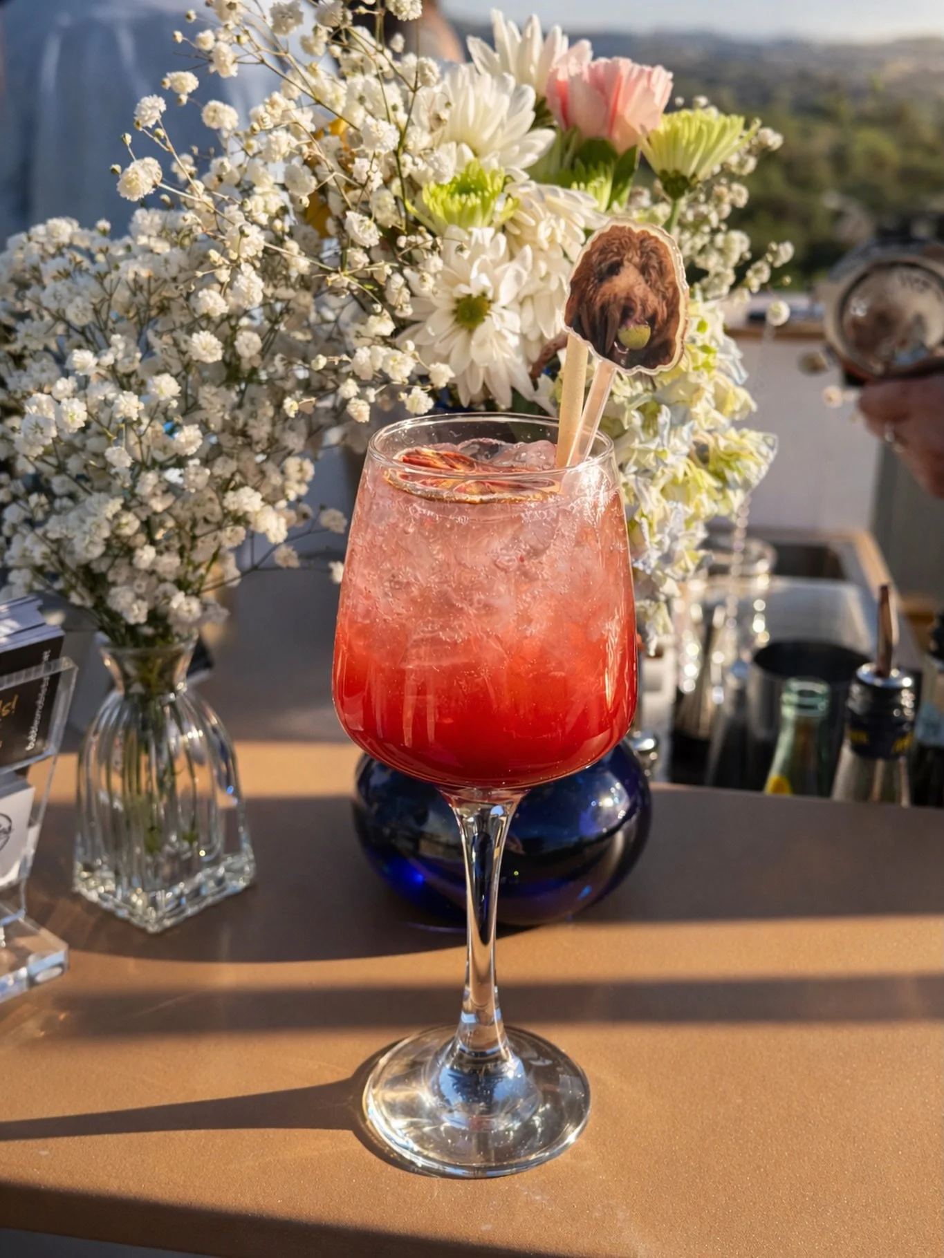 Last weekend&rsquo;s crowd favorite: Blood Orange Spritz 🍊

Made even more special for the bridal party with custom drink toppers featuring their beloved pup. 🐾

We love when couples bring us their vision &mdash; and we get to pour it into a glass.