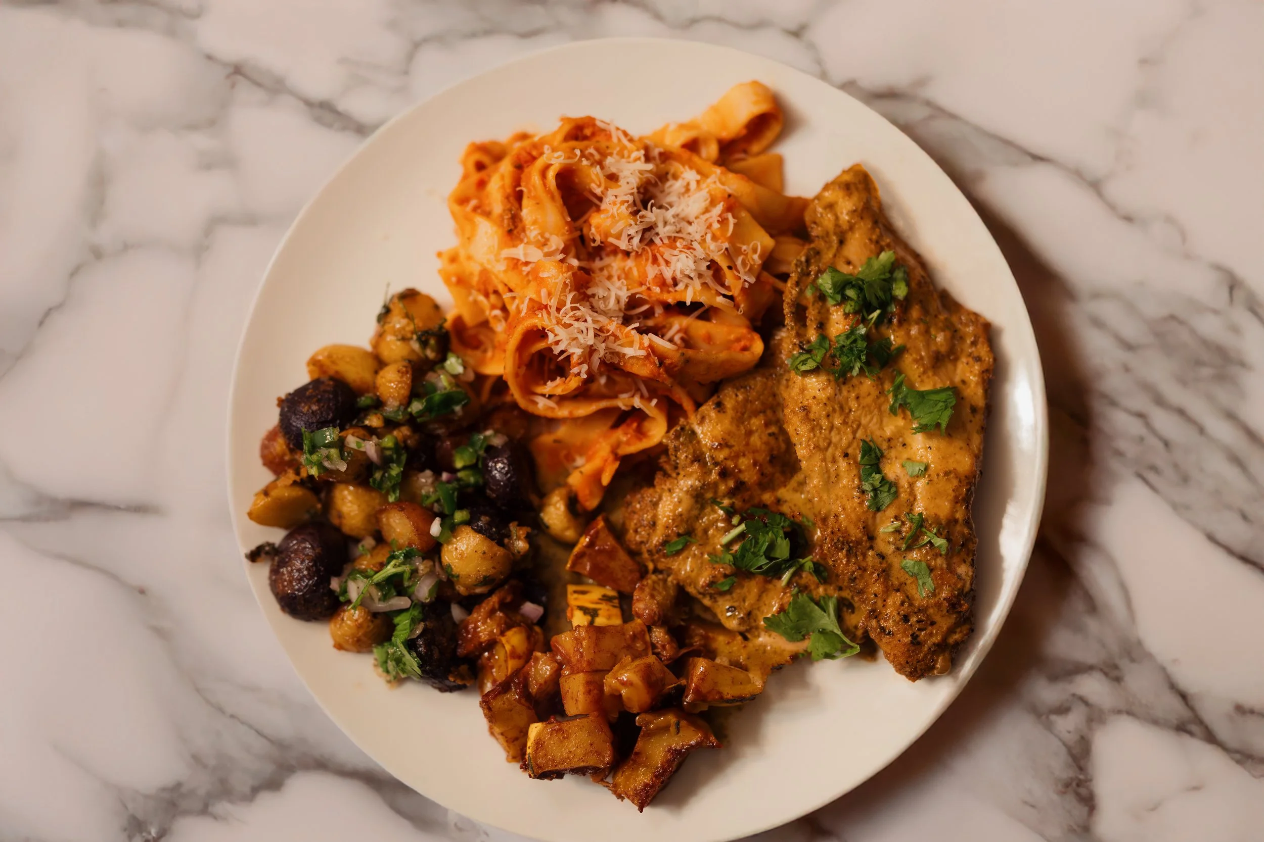 Creamy Pesto Chicken with Roasted Potatoes and Squash & Vodka Sauce Pasta