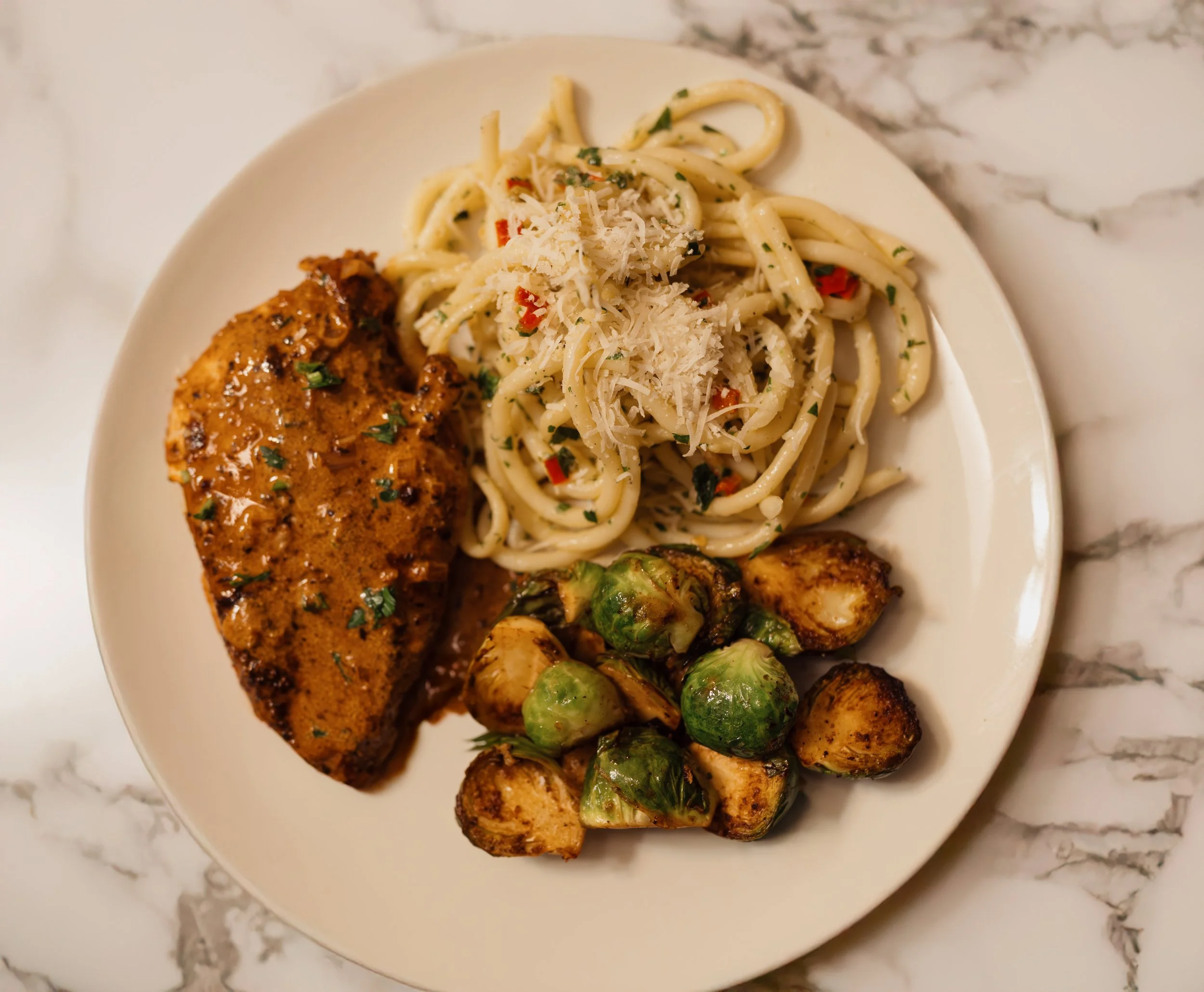 Pepper & Cream Garlic Chicken with Aglio e Olio and Roasted Brussels Sprouts