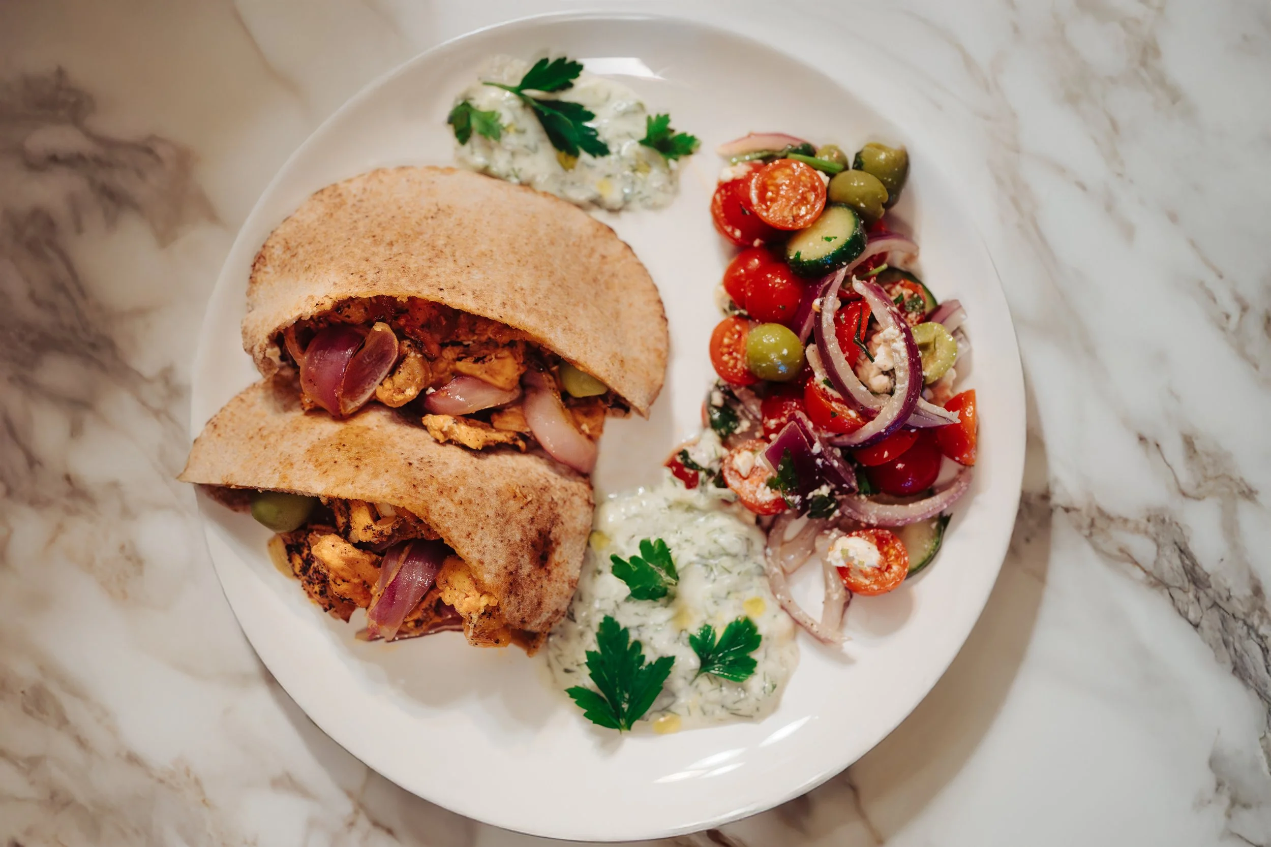 Baked Chicken in Pita with a Mediterranean Salad & Tzatziki