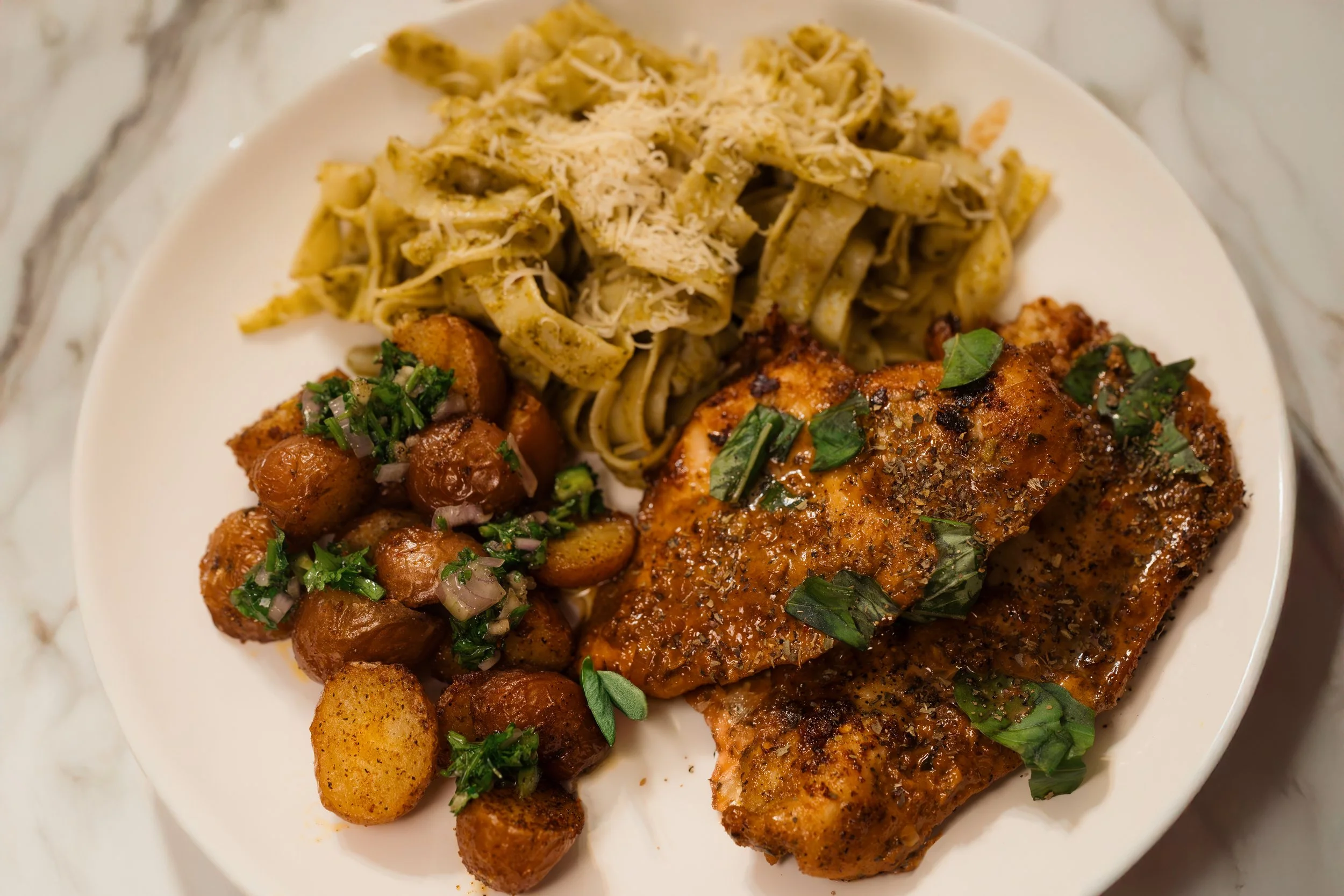 Creamy Garlic Chicken with Roasted Potatoes & Pesto Pasta