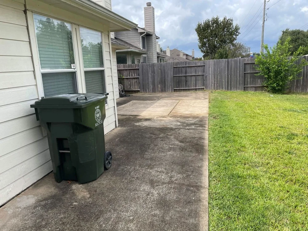 Full view of the rear patio after cleanup