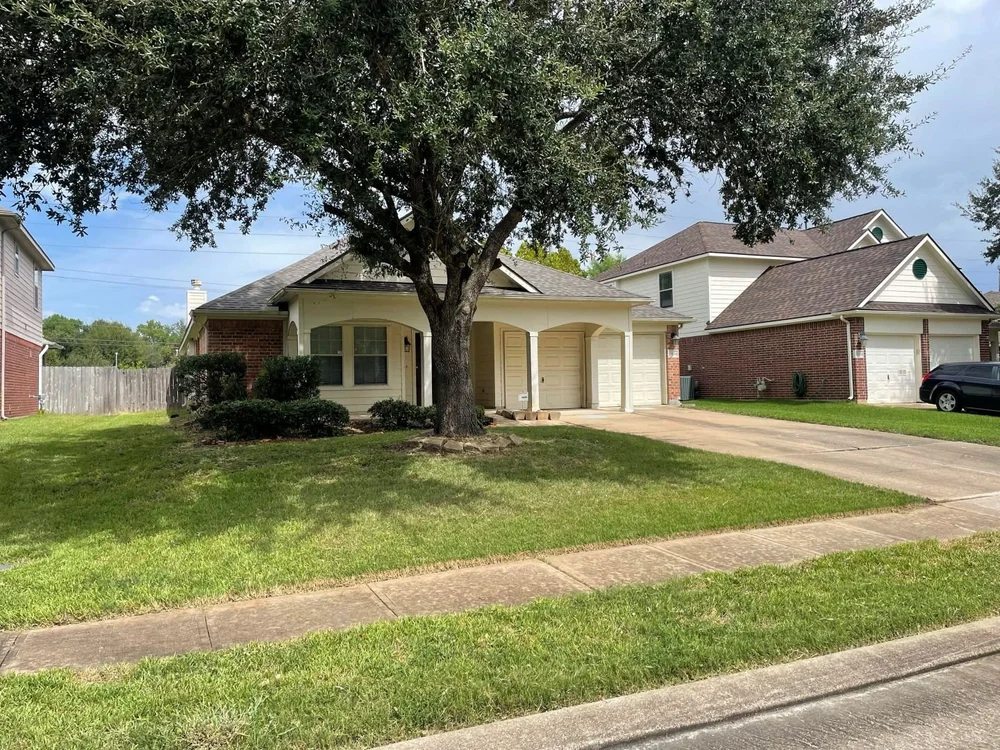 ReedMow property cleanup: finished front yard, mowed and edged, Sugar Land, TX
