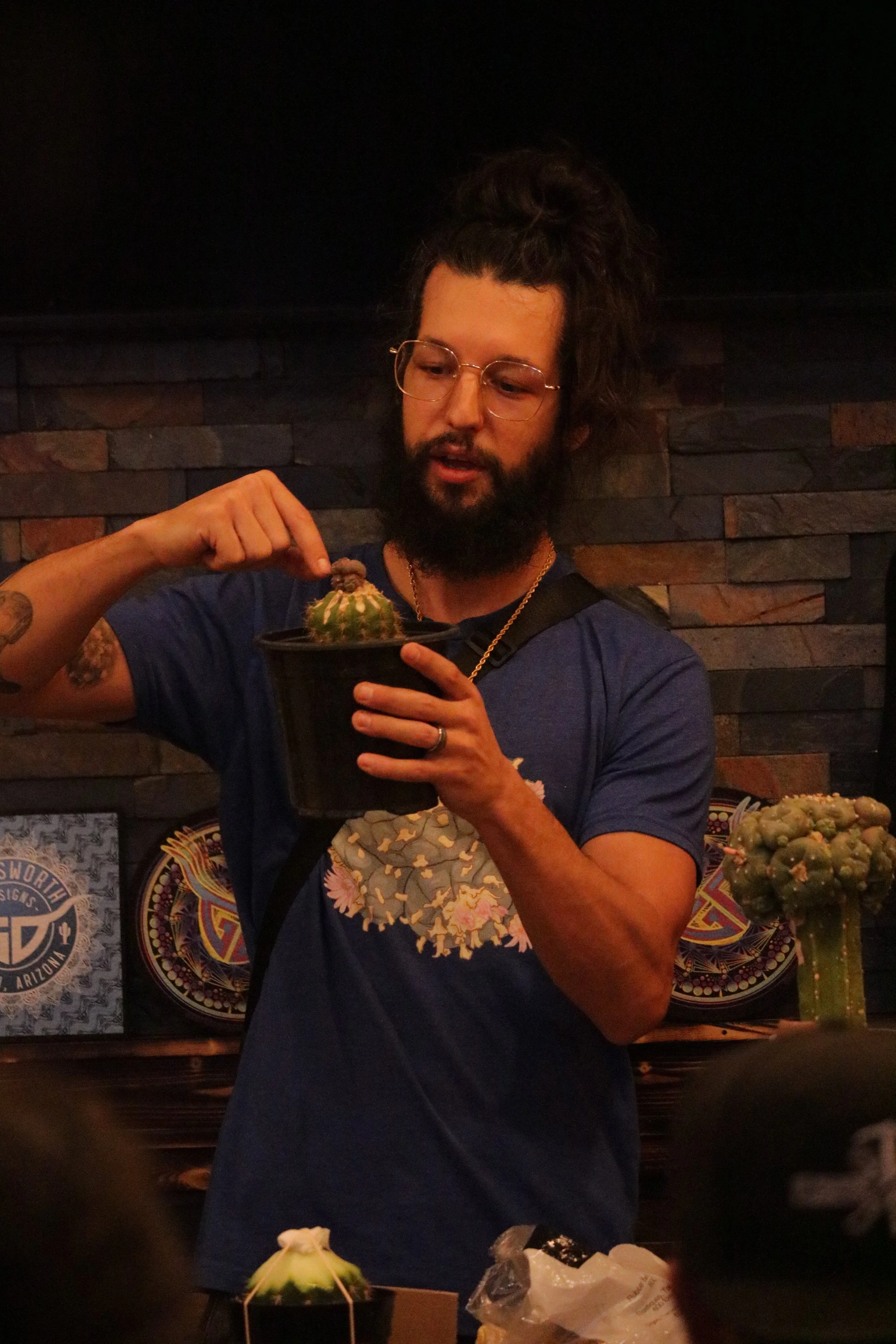 Taylor, Glassworth Designs, teaching a cactus grafting class at Sunset Glass gallery