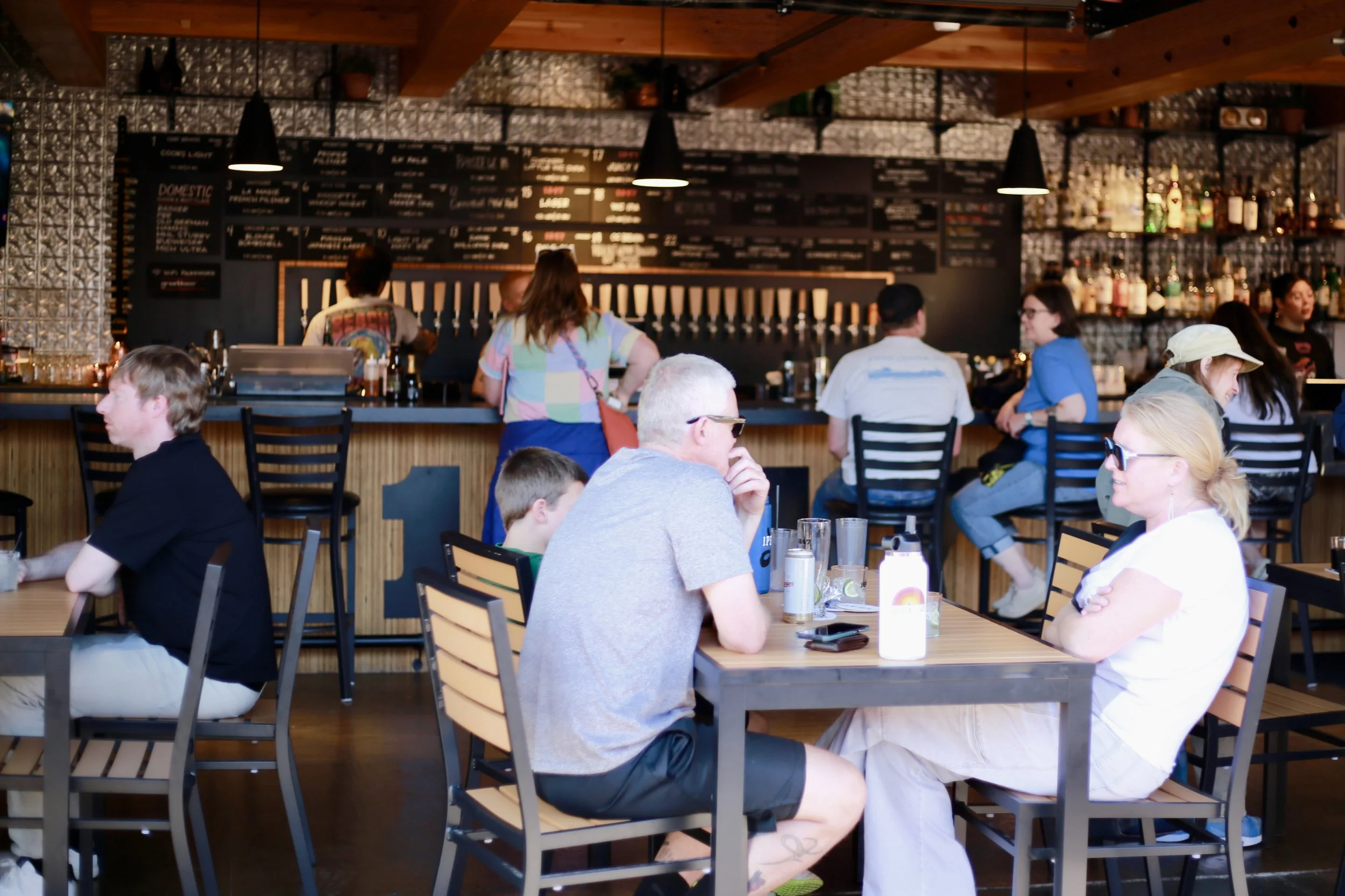 people socializing at tables