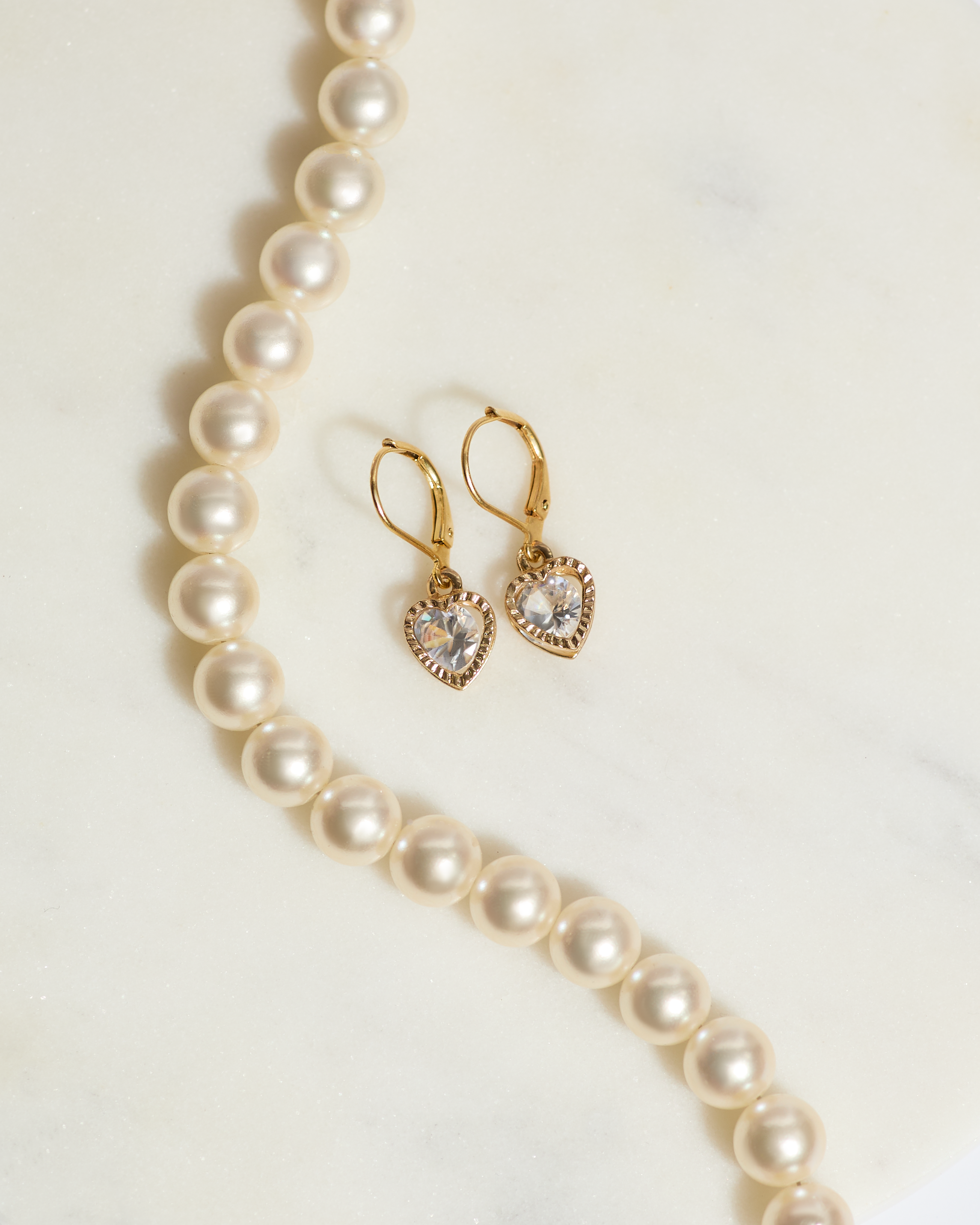 Gold Crystal Heart Earrings.png