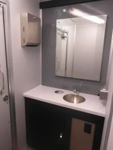 Interior of luxury restroom trailer with sink